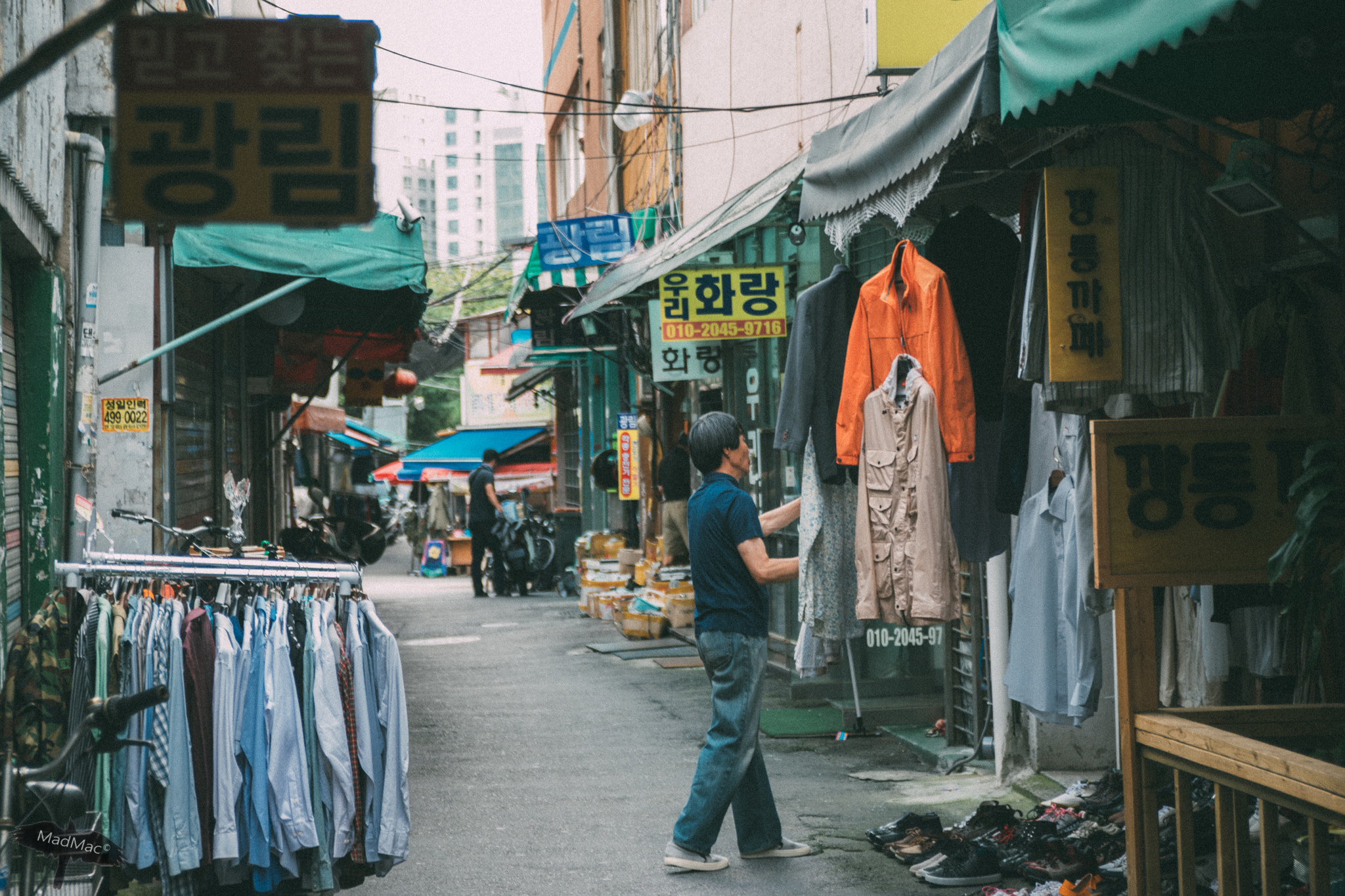 Nikon D5300 + Sigma 18-50mm F2.8 EX DC Macro sample photo. Clothes shops photography