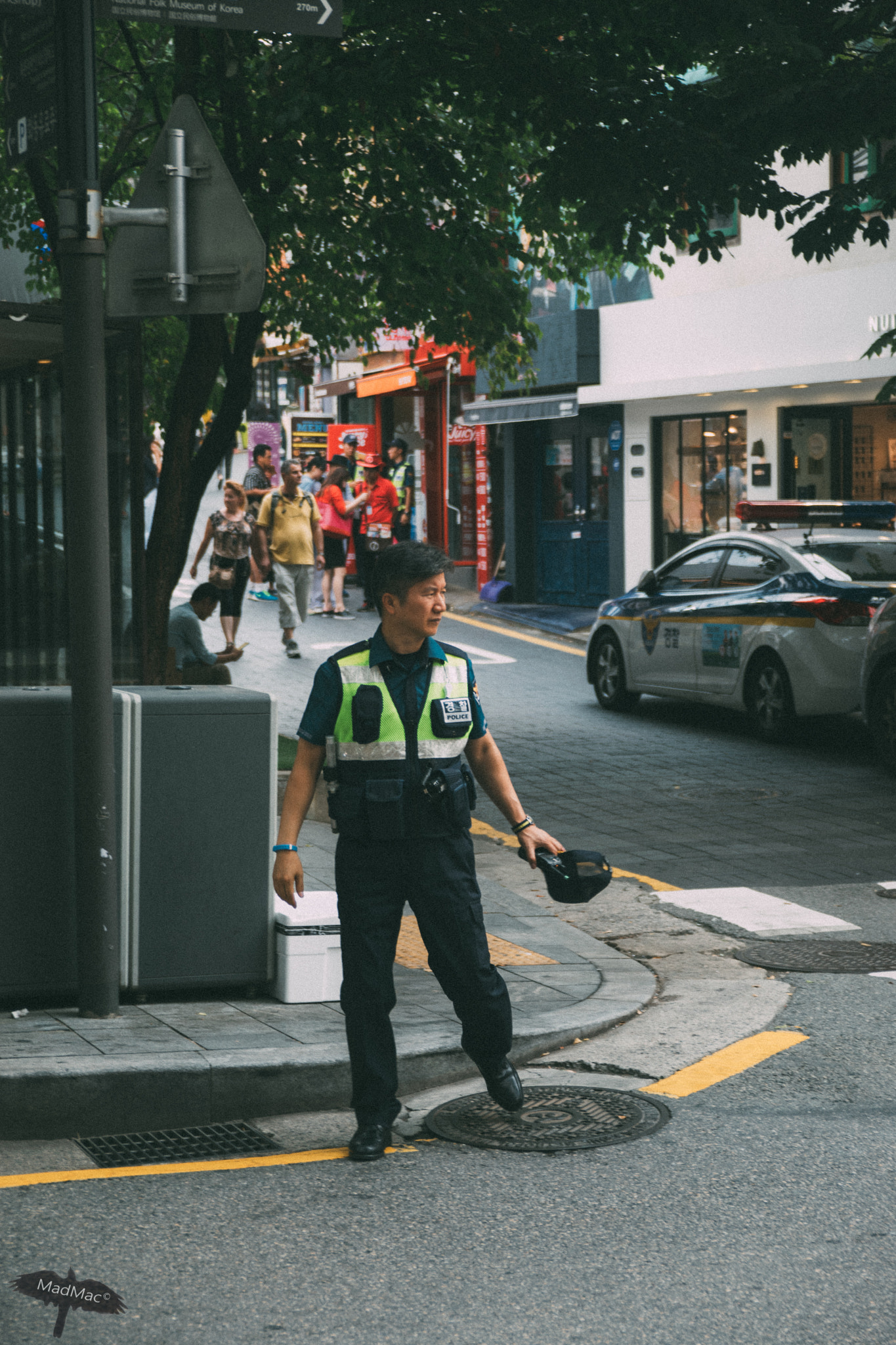 Nikon D5300 + Sigma 18-50mm F2.8 EX DC Macro sample photo. Police man photography