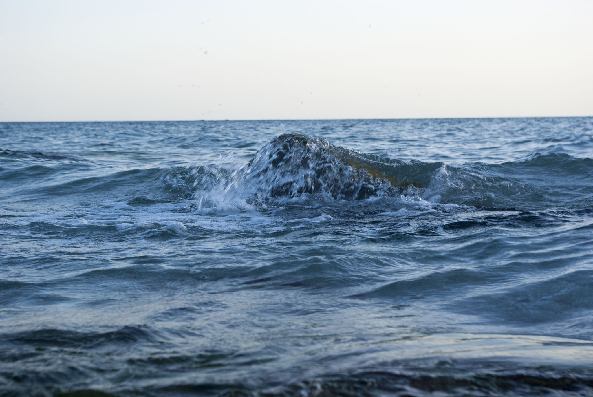 Pentax smc DA 18-55mm F3.5-5.6 AL WR sample photo. Rock and the sea photography