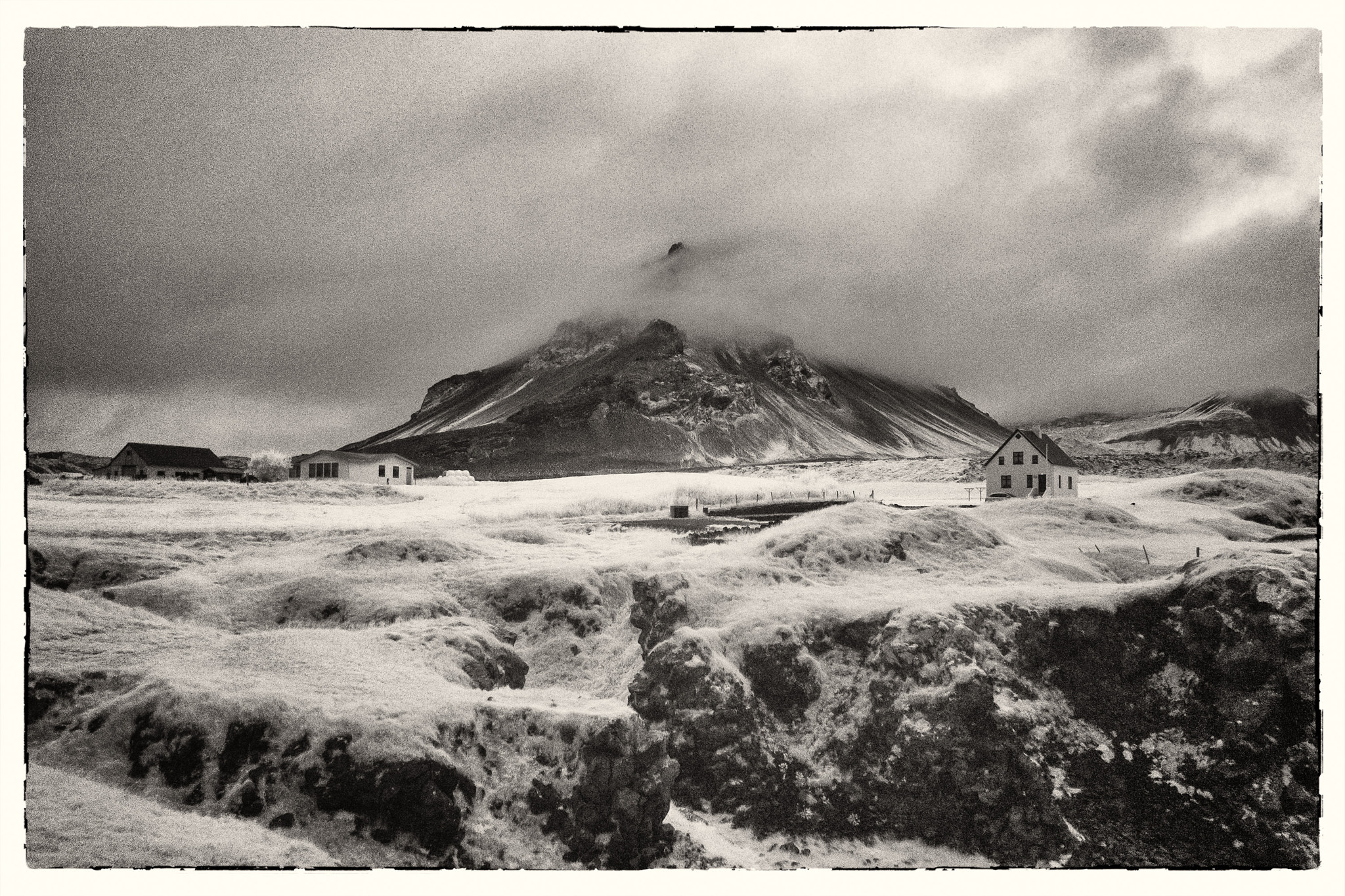 Sony Alpha NEX-5R + Sony E 16mm F2.8 sample photo. Stapafell in clouds (noise is beautiful) photography