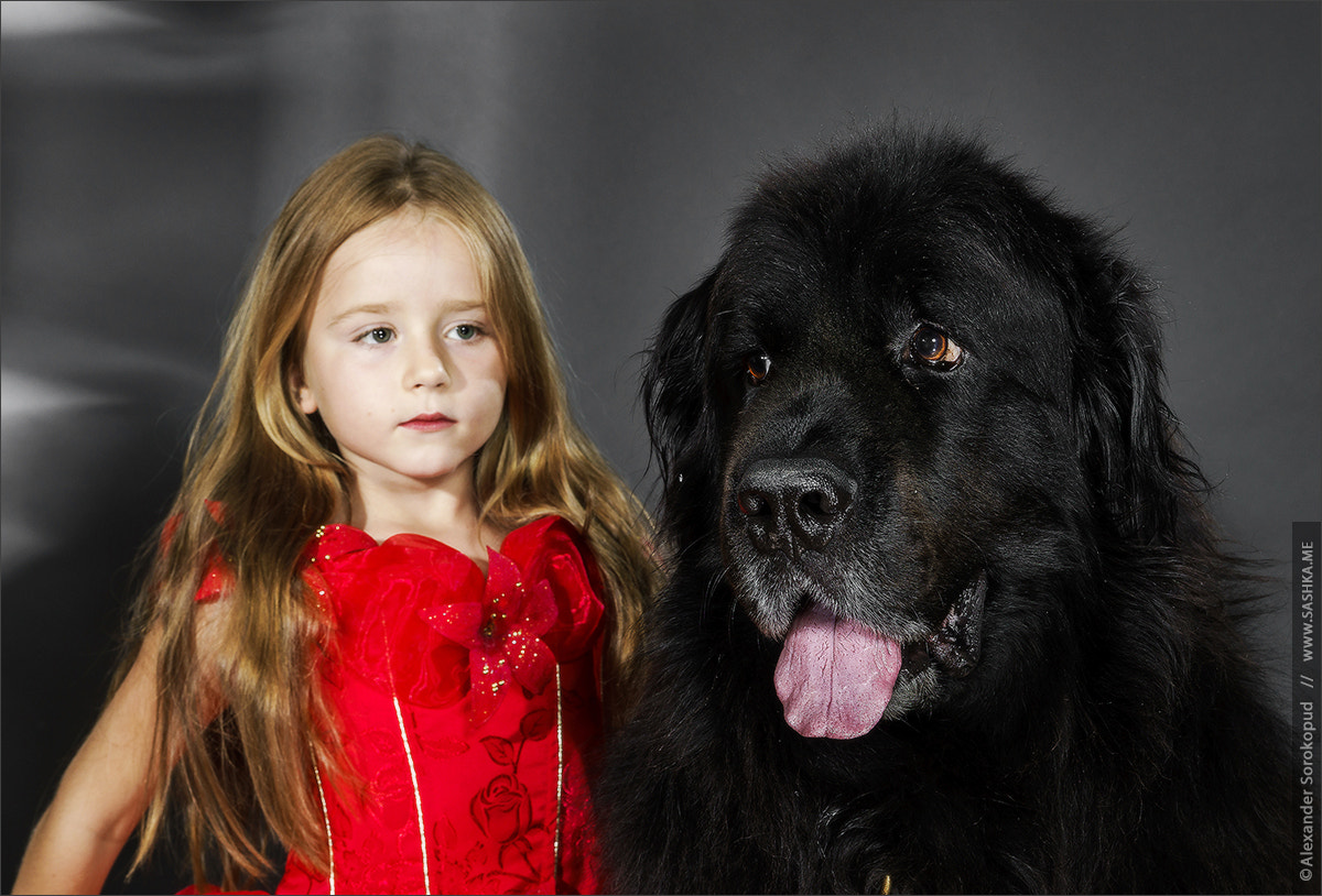 Sony a99 II sample photo. Beauty and the beast. girl with big black water-dog. photography