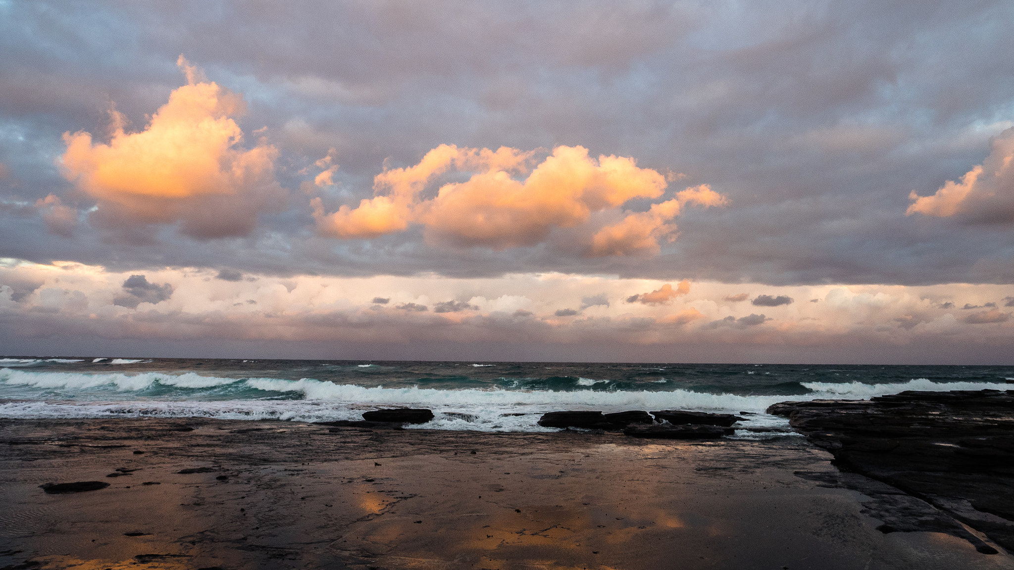 Olympus OM-D E-M1 + OLYMPUS M.12mm F2.0 sample photo. Dolphin point rocky outcrop at sunset. photography