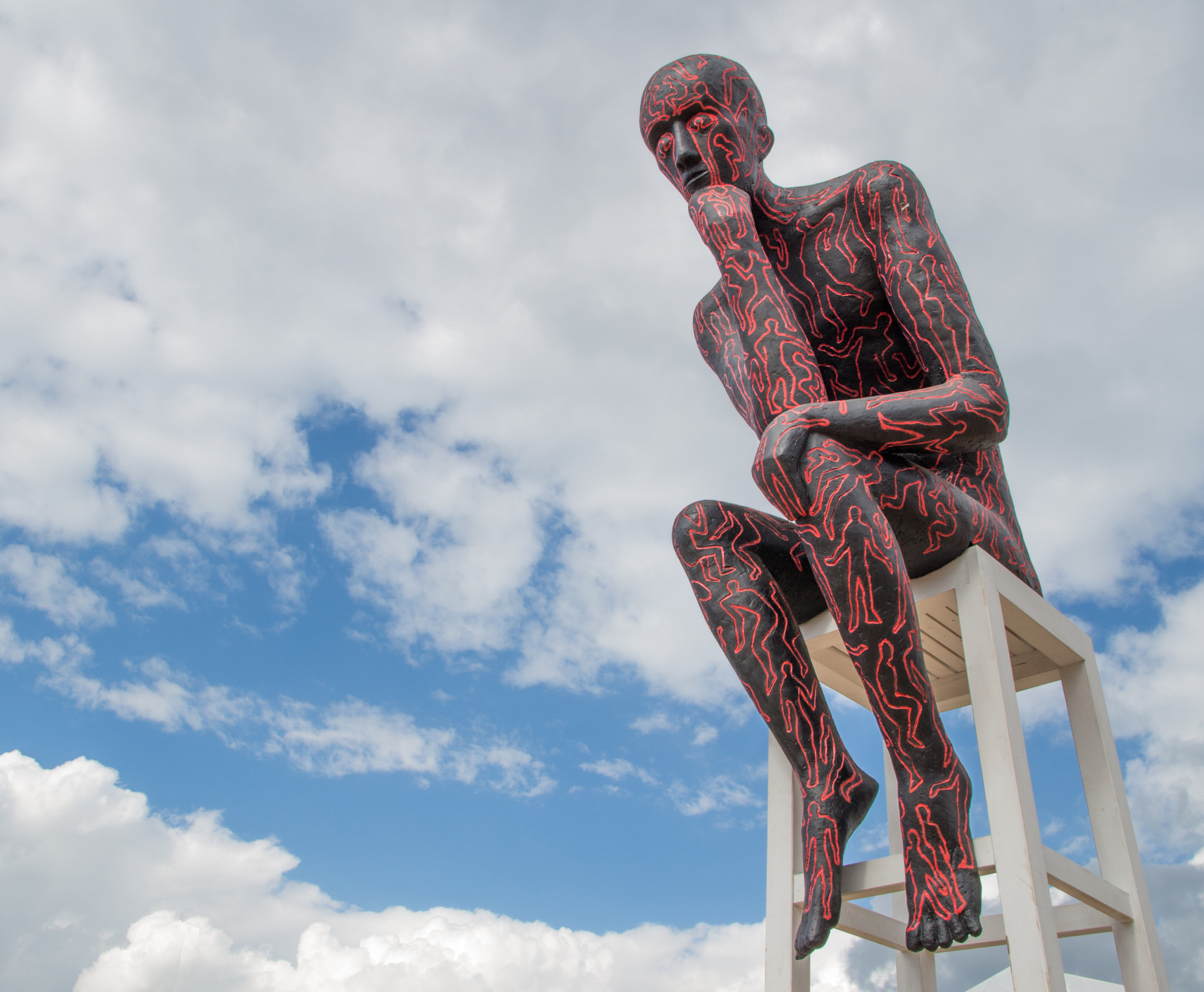 Canon EF-S 17-55mm F2.8 IS USM sample photo. Statue in the clouds photography