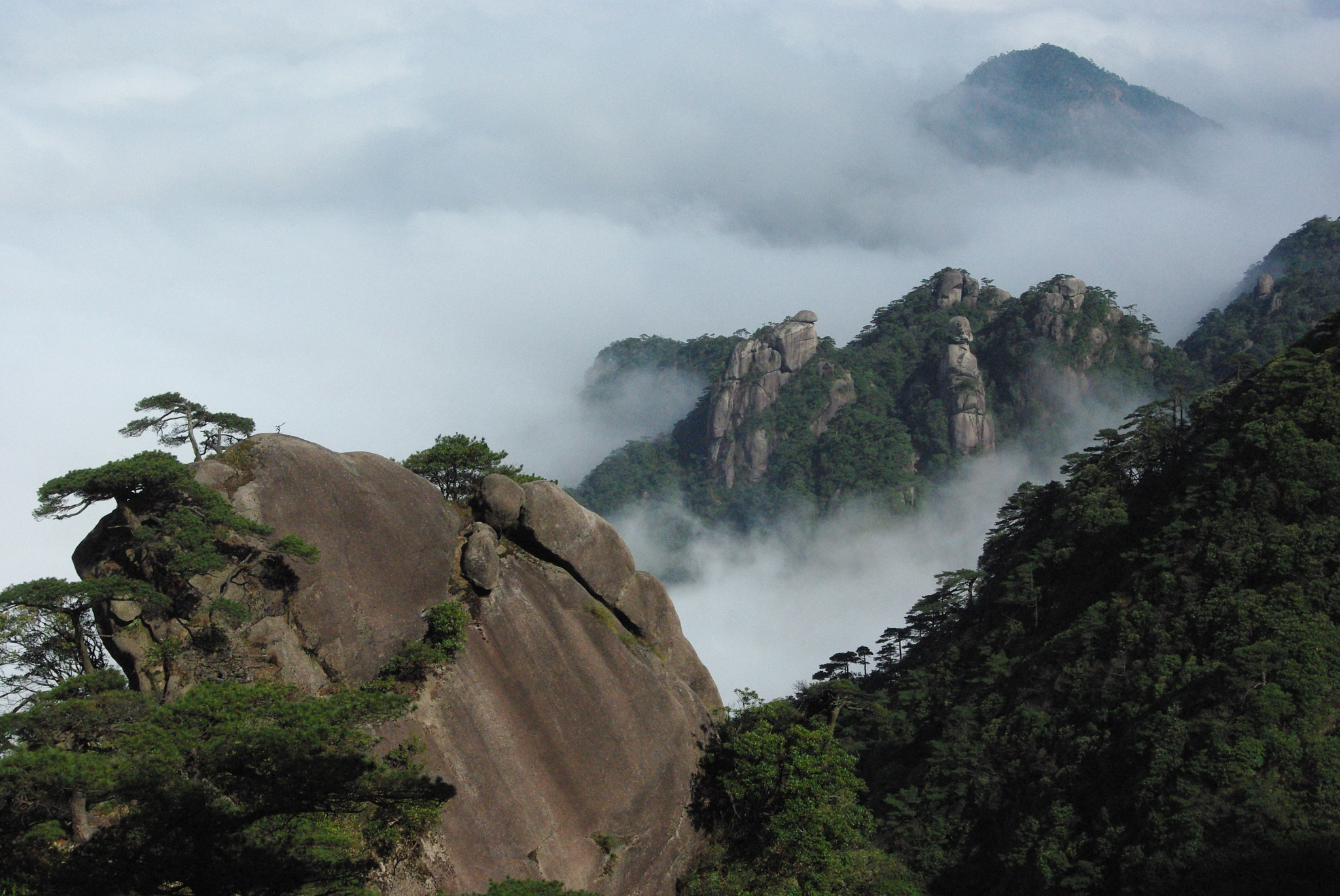 Pentax K200D sample photo. Mountains in clouds photography