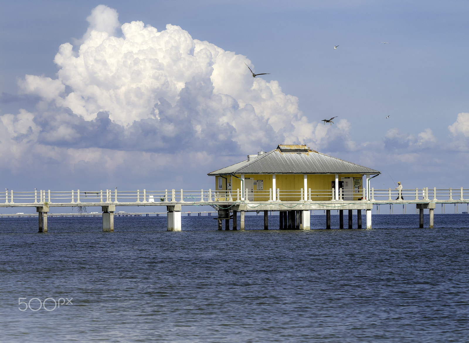 Canon EF 100mm F2.8L Macro IS USM sample photo. Yellow building on fishing pier photography