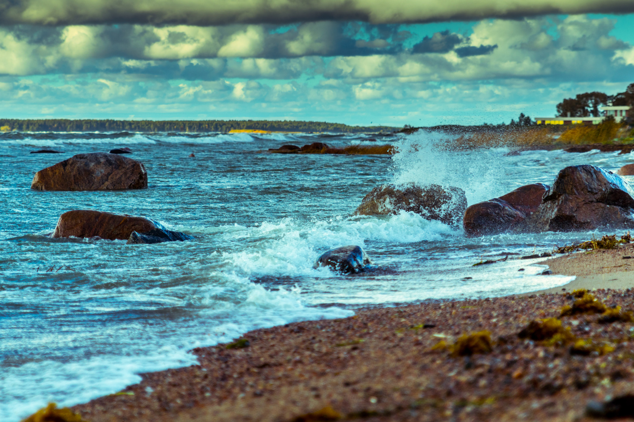 Canon EOS 80D + Sigma 24-70mm F2.8 EX DG Macro sample photo. Waves hiting the rocks on the beach photography