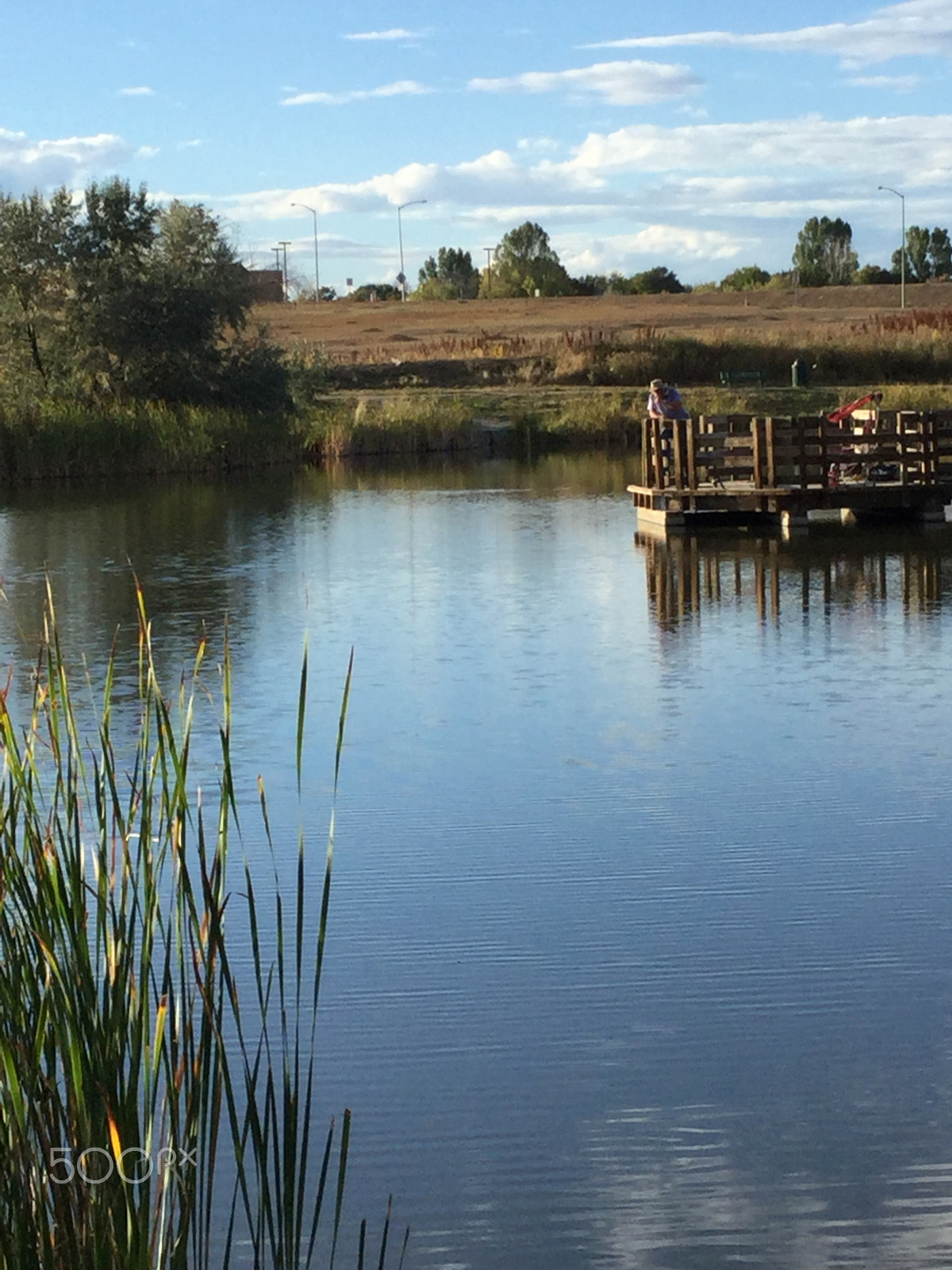 Apple iPad5,3 sample photo. Fisherman on a dock photography