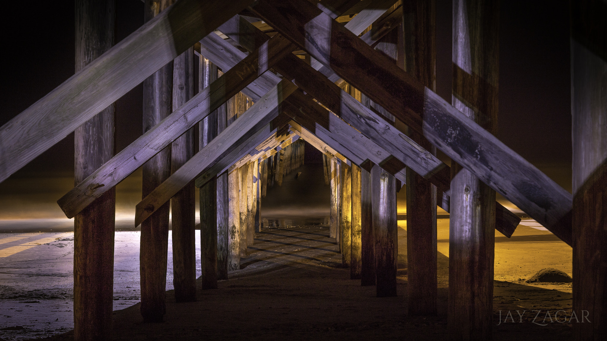 Sony ILCA-77M2 + Sony DT 50mm F1.8 SAM sample photo. Under the weathered pier photography