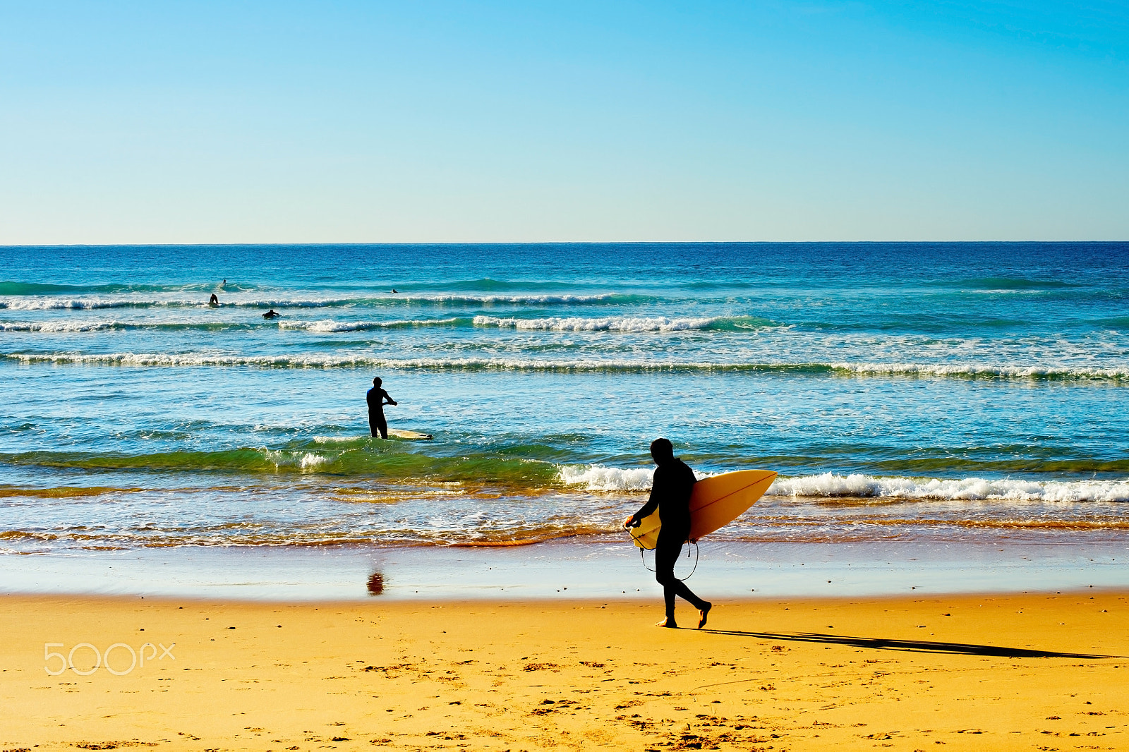 Nikon AF Nikkor 50mm F1.4D sample photo. Surfers on a beach photography