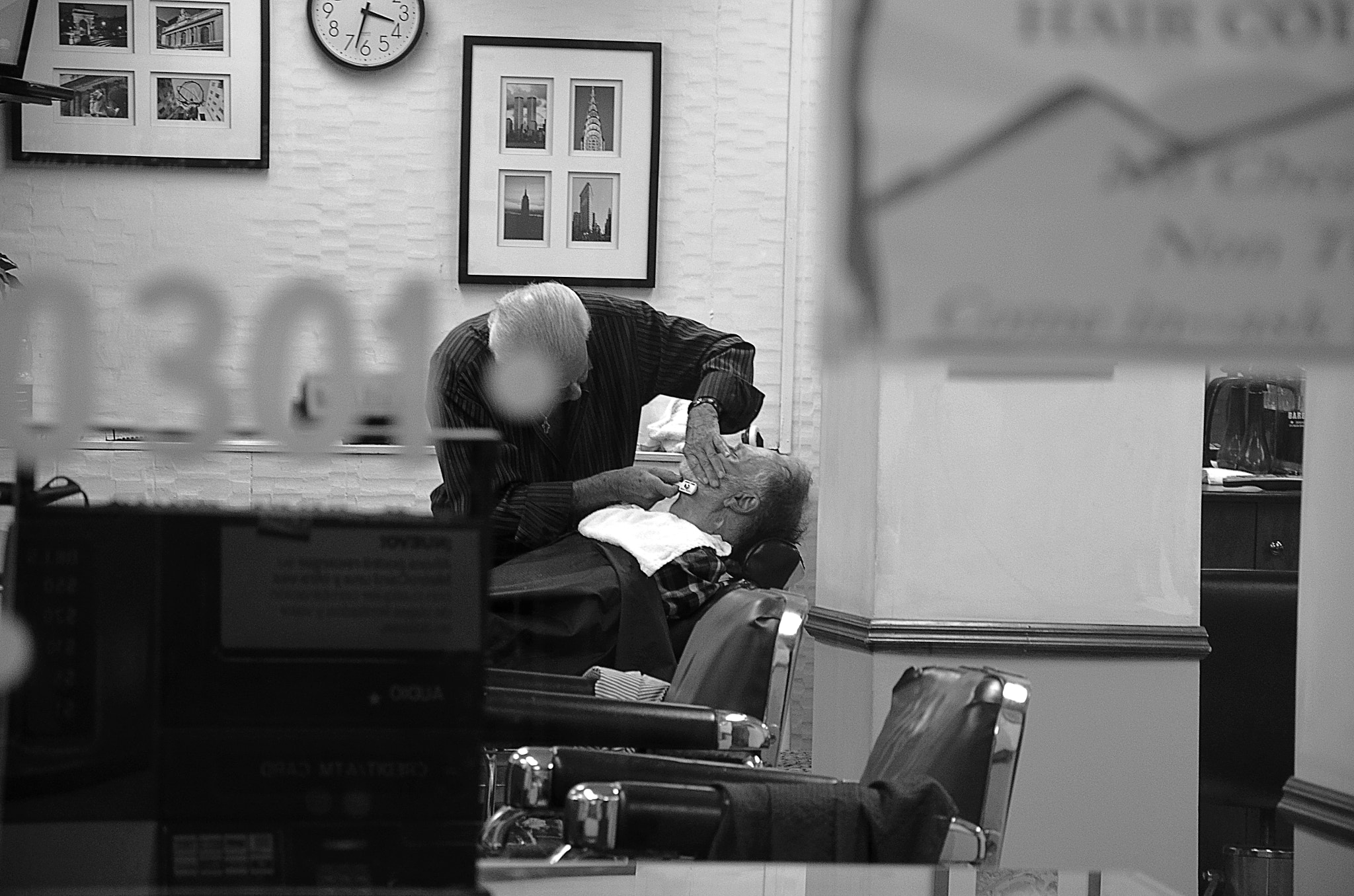 IX-Nikkor 30-60mm f/4-5.6 sample photo. Barber in brooklyn photography