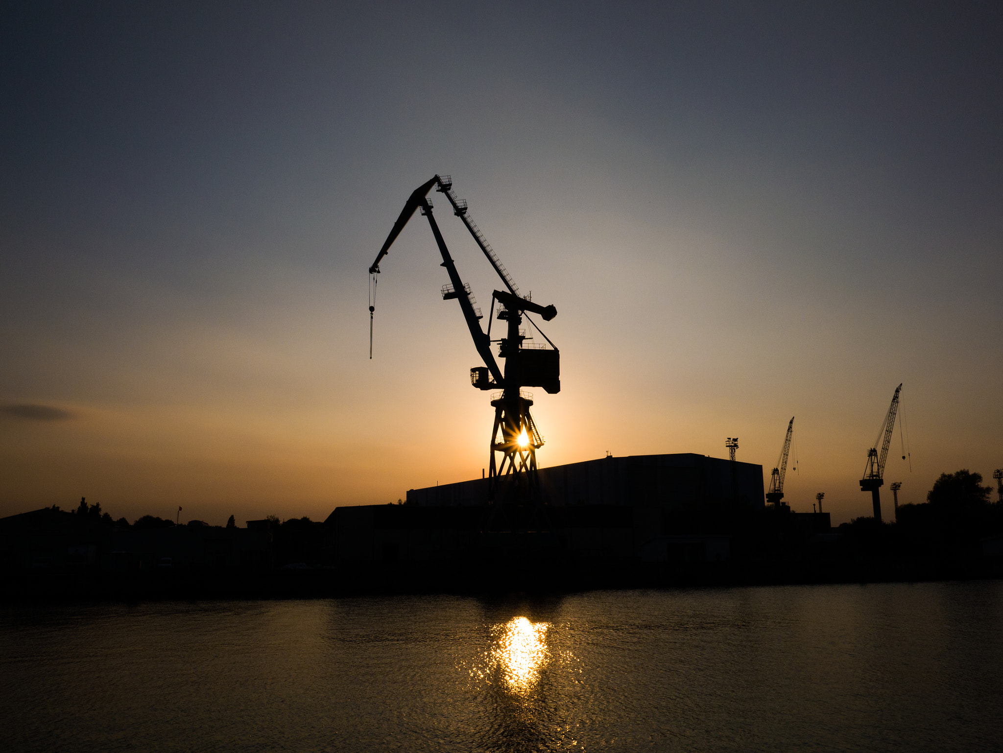 Panasonic Lumix DMC-GF6 + LEICA DG SUMMILUX 15/F1.7 sample photo. Crane in wismar's harbour photography