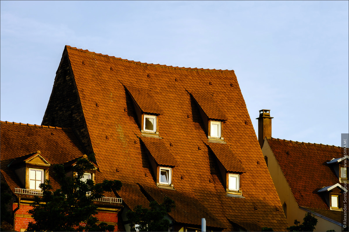 Sony a99 II sample photo. Red tile roofs of old buildings in historical center of strasbou photography
