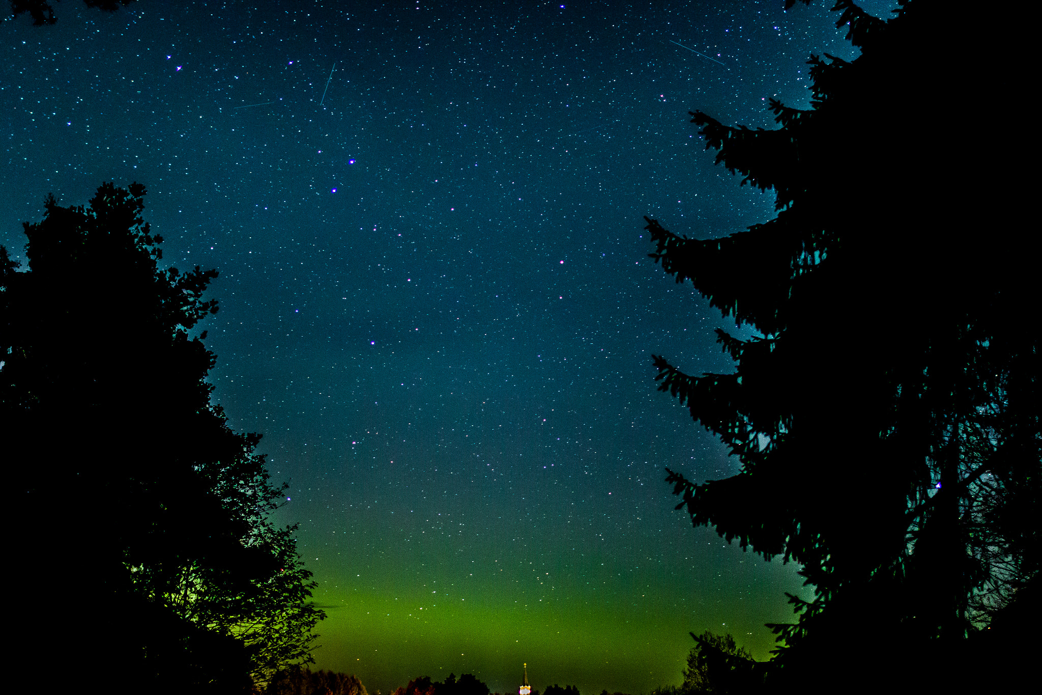 Canon EOS 70D sample photo. Northern light over a church with three shooting stars photography