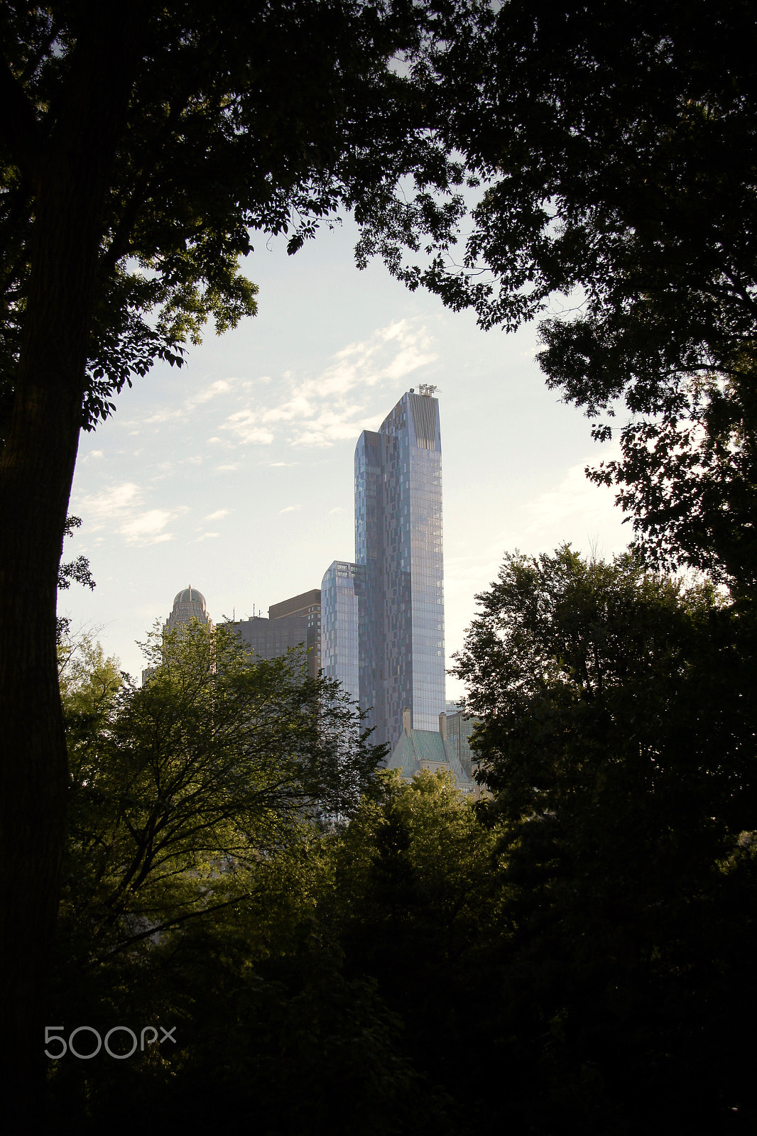 Canon EOS 550D (EOS Rebel T2i / EOS Kiss X4) + Sigma 18-125mm F3.8-5.6 DC OS HSM sample photo. One57 building seen from central park photography