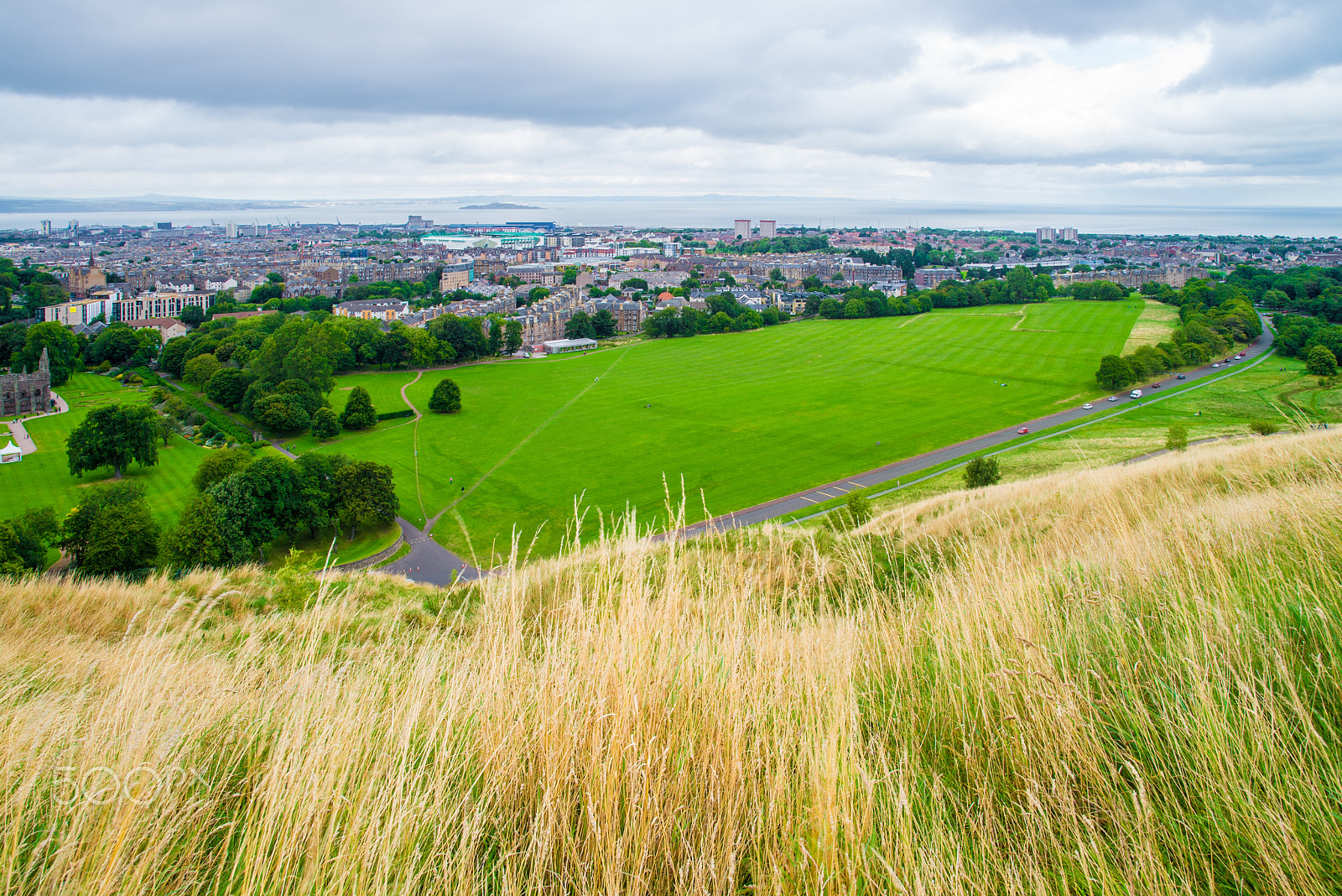 Sigma 24-60mm F2.8 EX DG sample photo. Green meadow at foot of hoyrood park photography