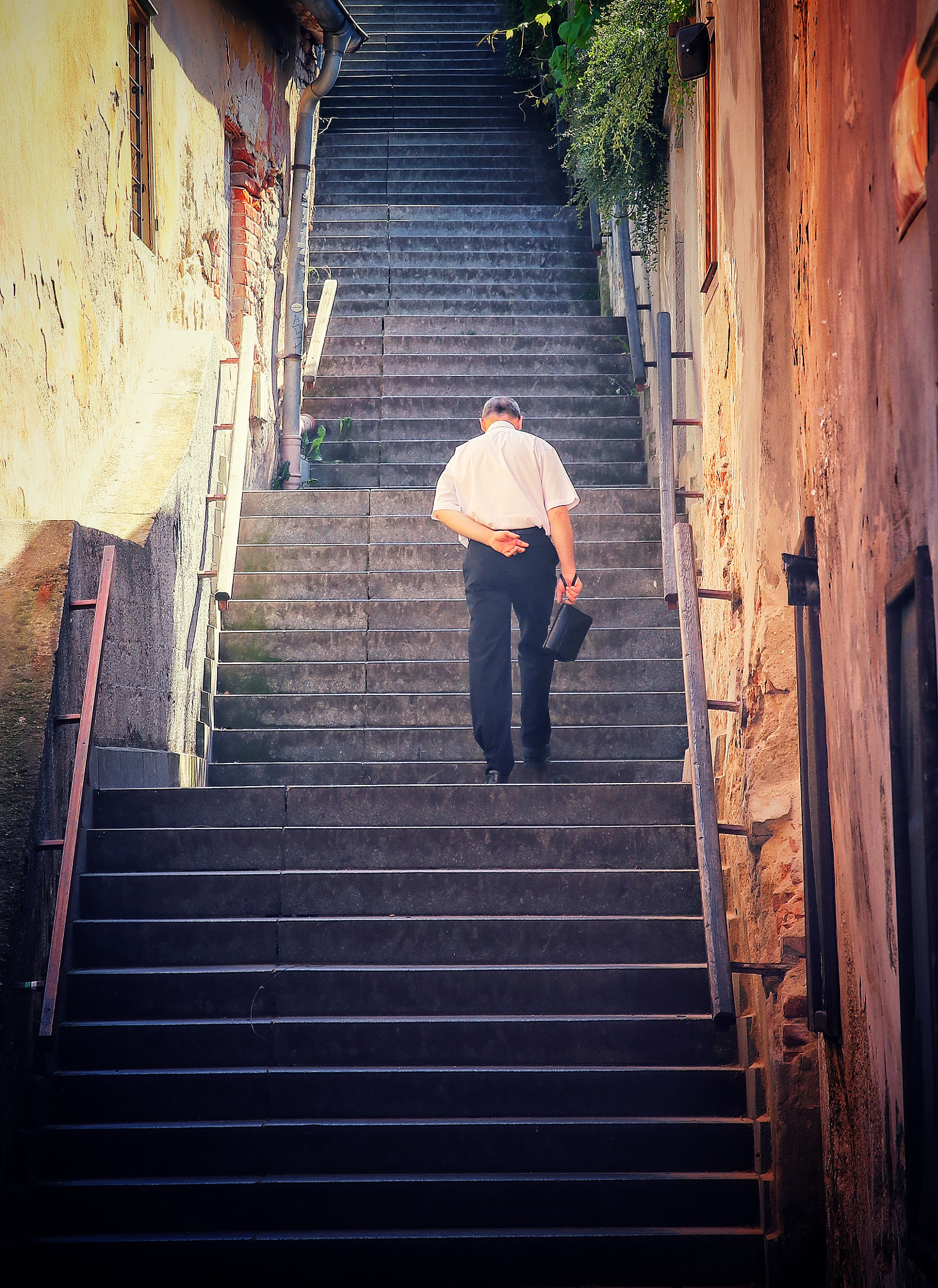 Canon EOS 7D Mark II sample photo. Lonely man on the stairs photography