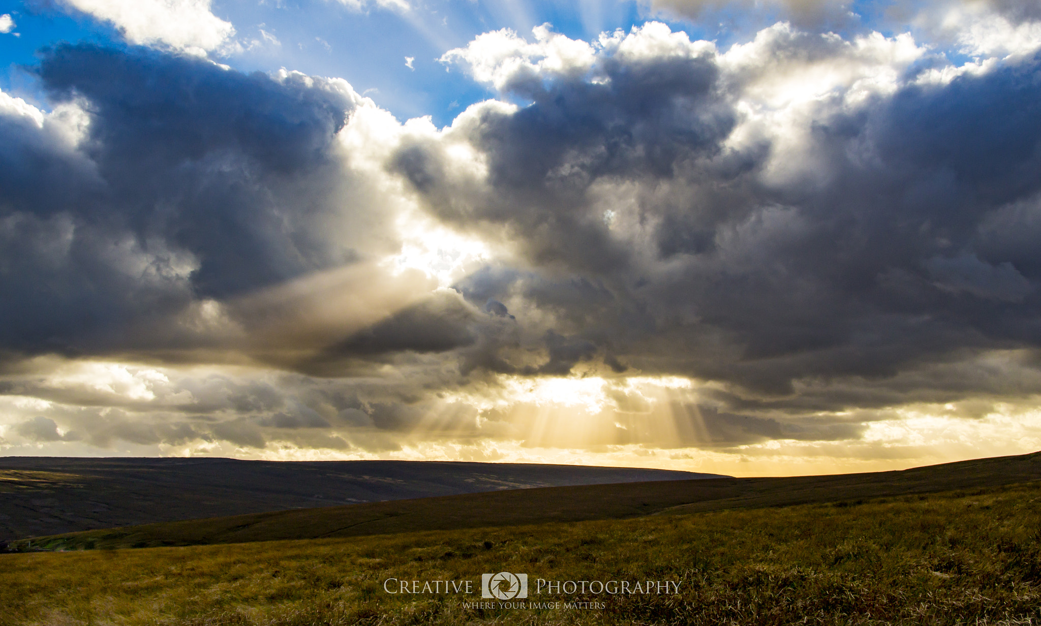 Canon EF-S 17-55mm F2.8 IS USM sample photo. Sun through the clouds photography