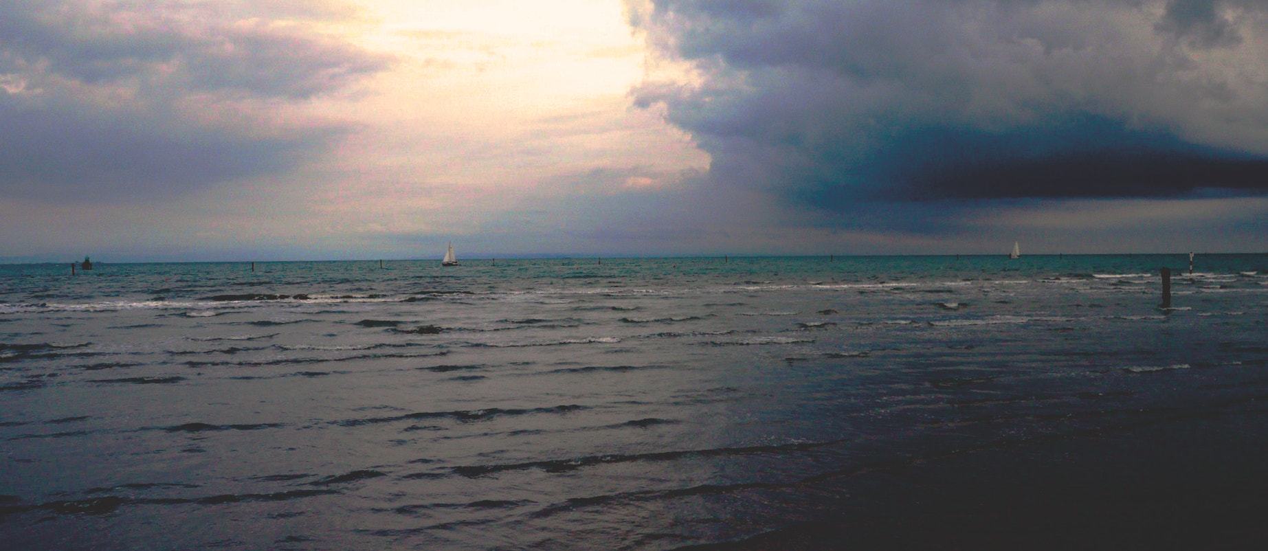 LUMIX G VARIO PZ 14-42/F3.5-5.6 sample photo. First lights  on the coast photography