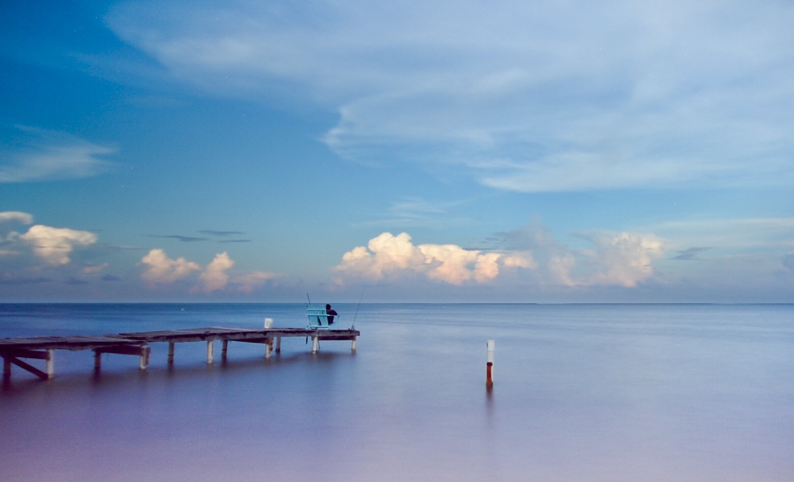 Sigma 10-20mm F4-5.6 EX DC HSM sample photo. Fisherman reflects on his catch. photography