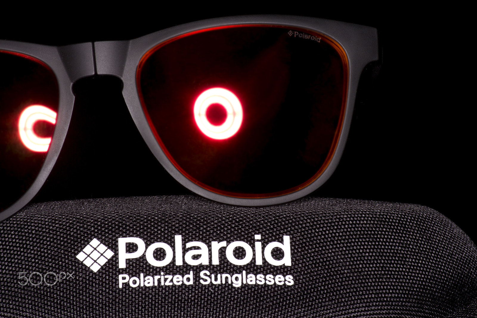 Canon EF-S 55-250mm F4-5.6 IS sample photo. Polaroid sunglasses photography