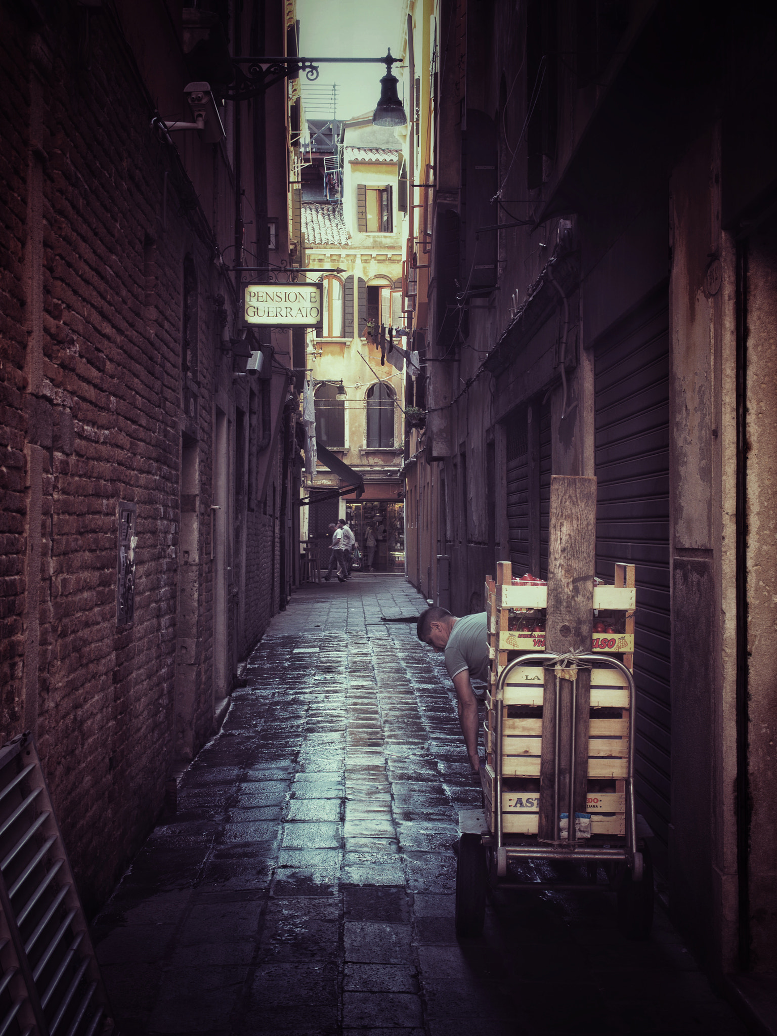 Panasonic Lumix G X Vario 12-35mm F2.8 ASPH Power OIS sample photo. Back alley delivery photography