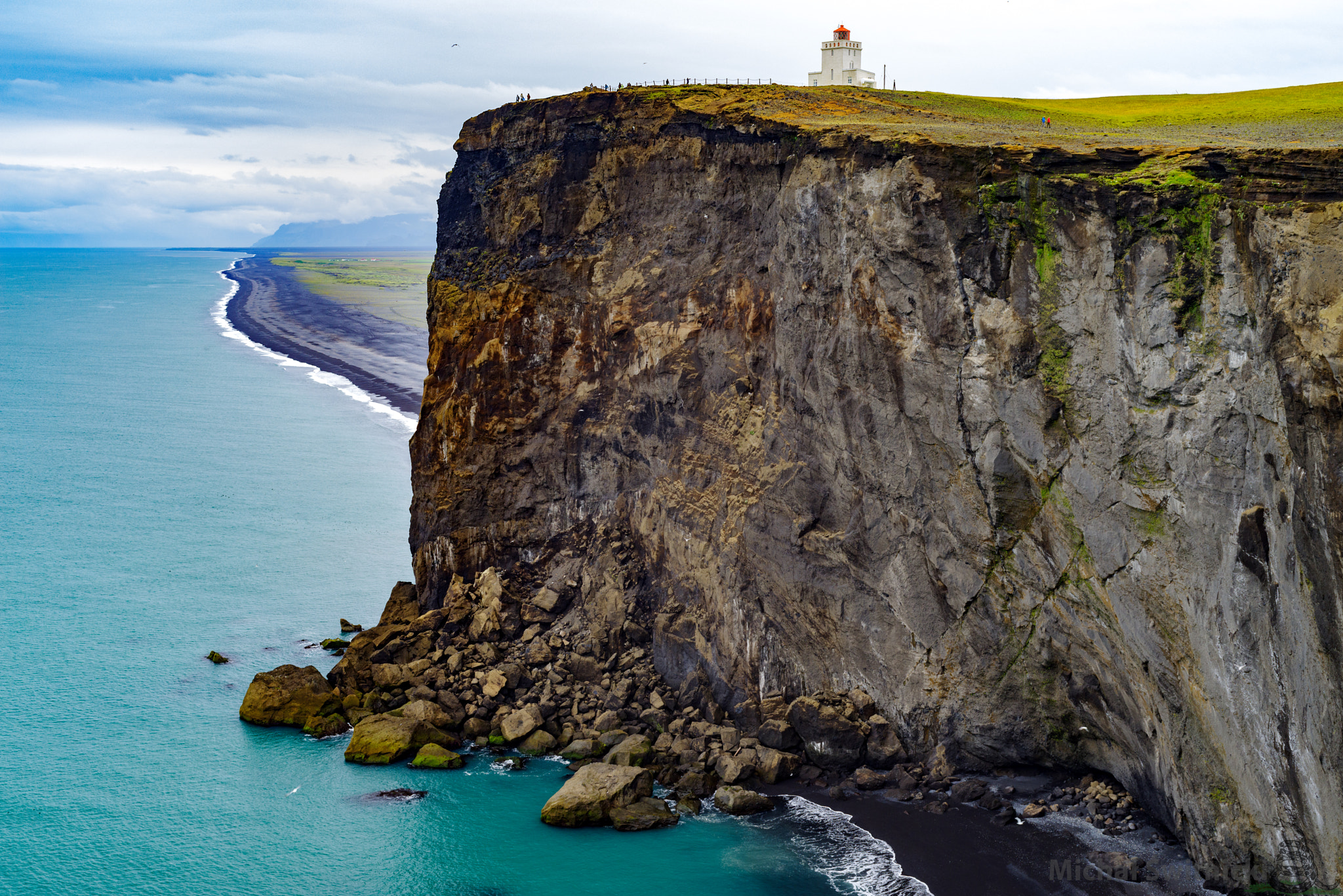 Pentax K-1 sample photo. Dyrhólaey cliffs and the lighthouse guarding it photography