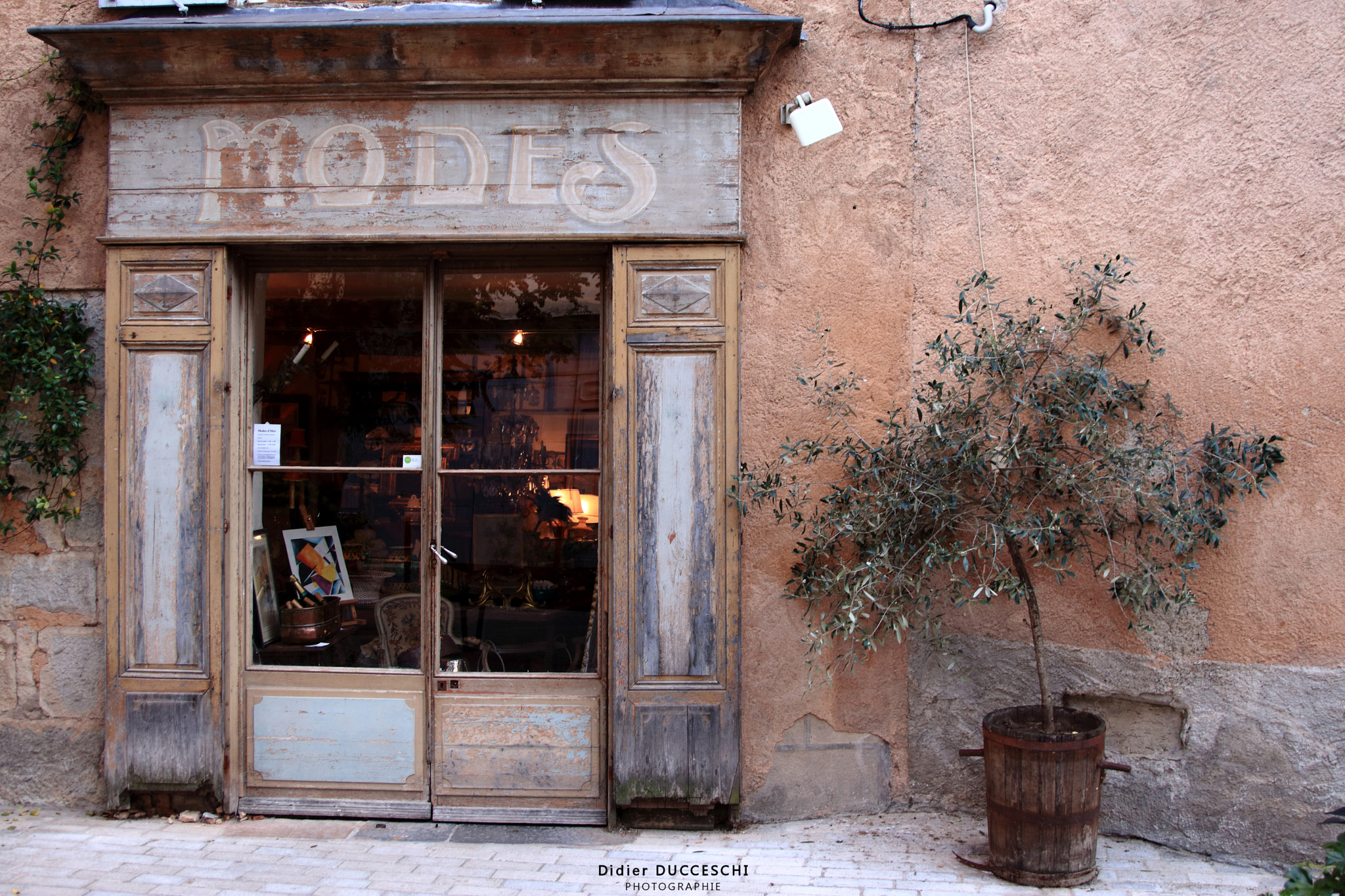 Sigma 18-50mm f/3.5-5.6 DC sample photo. Storefront from the past photography