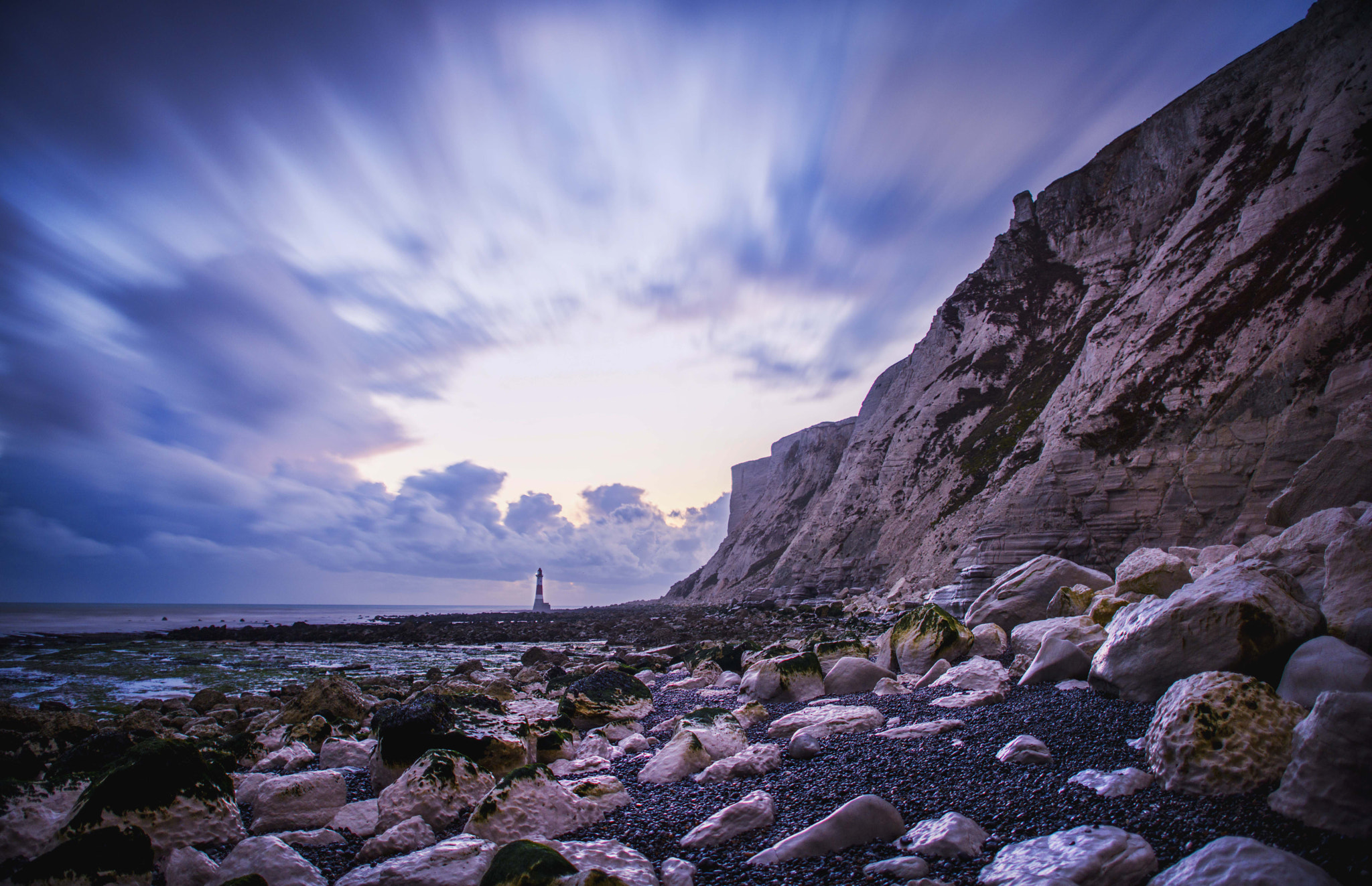 Nikon D810 sample photo. Stormy sunset over beachy head lighthouse photography