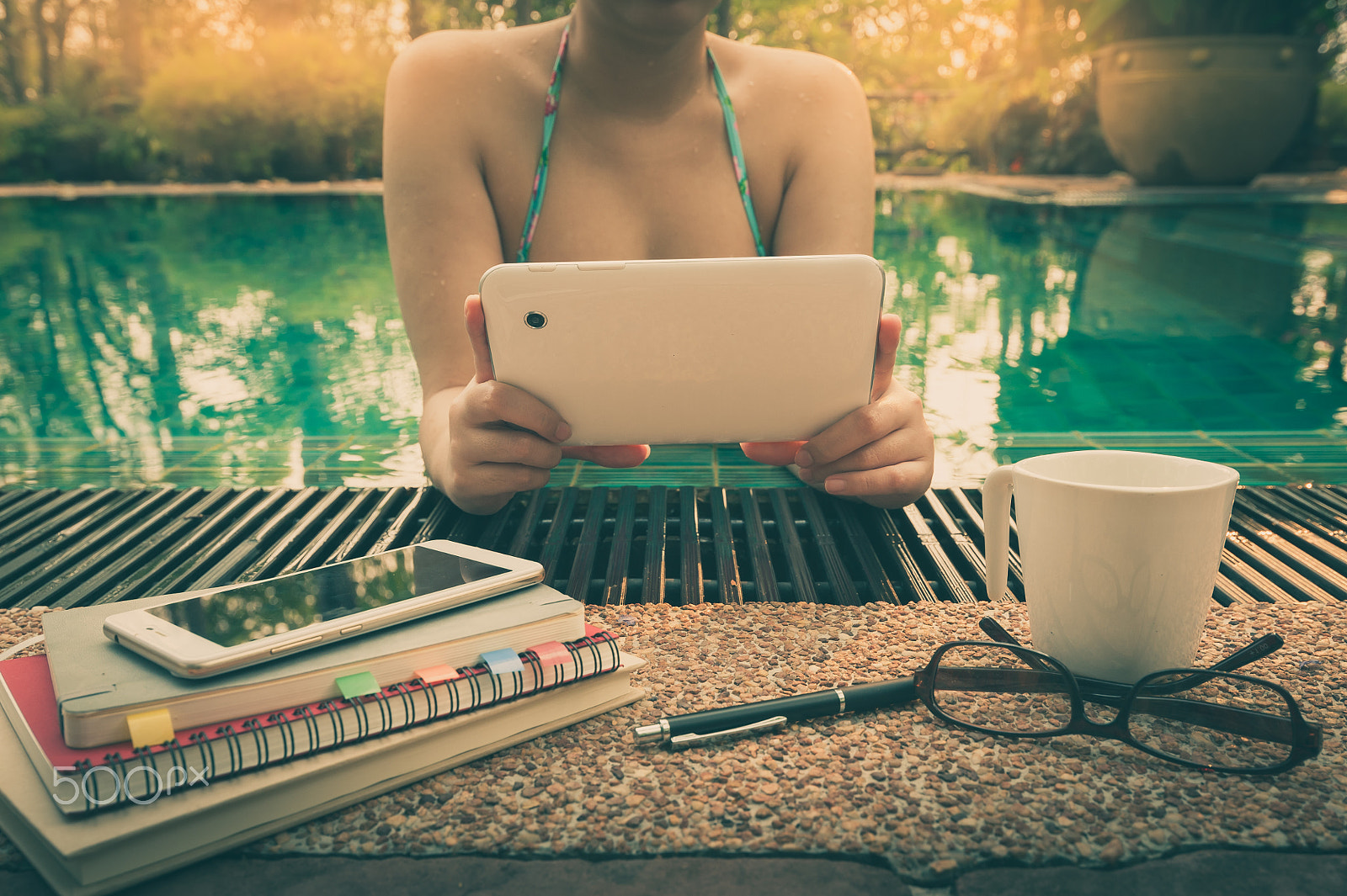 Nikon AF-S Nikkor 18-35mm F3.5-4.5G ED sample photo. Woman using phone in swimming pool photography