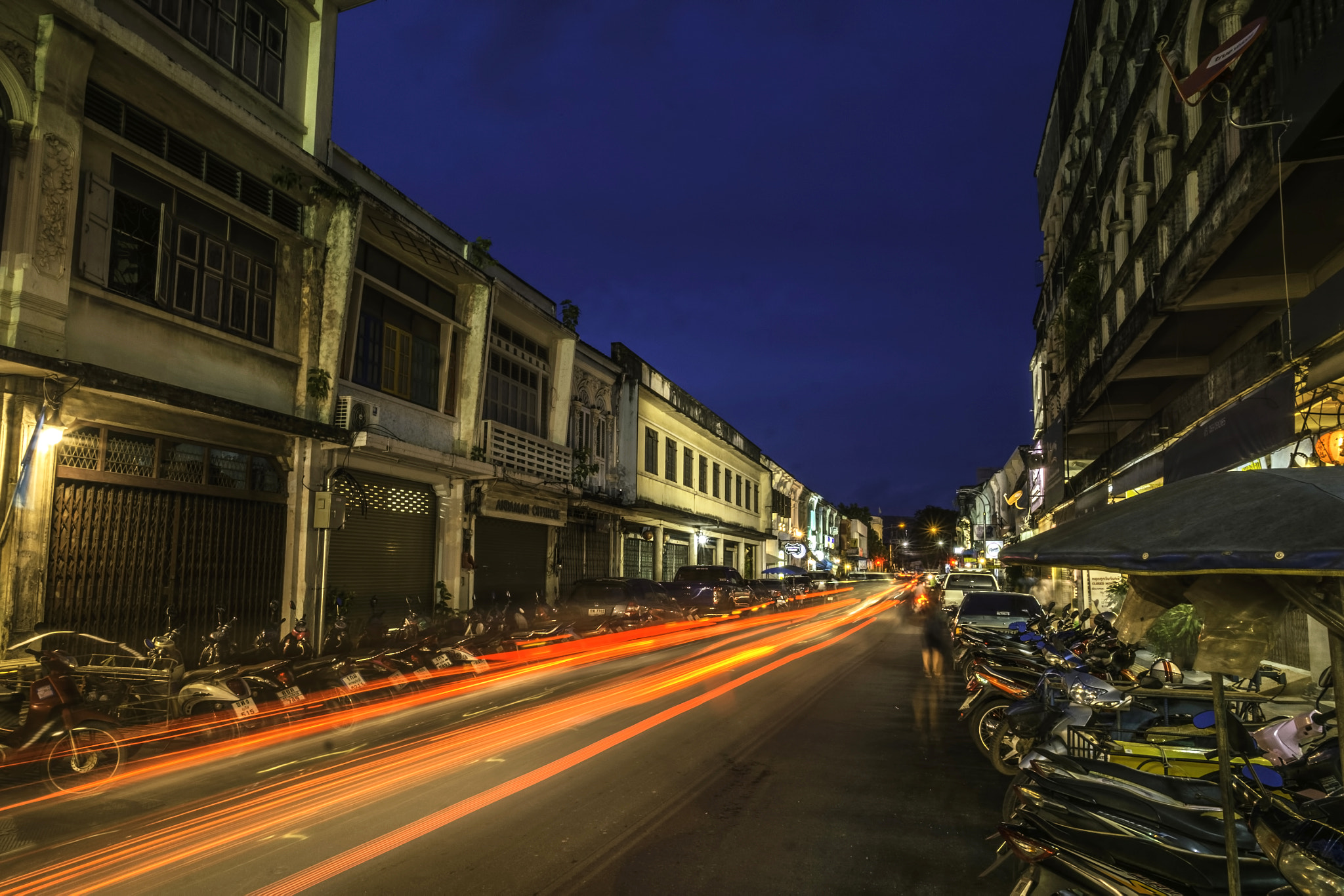 Fujifilm X-Pro1 + Fujifilm XF 14mm F2.8 R sample photo. Car lights trails in phuket old town photography