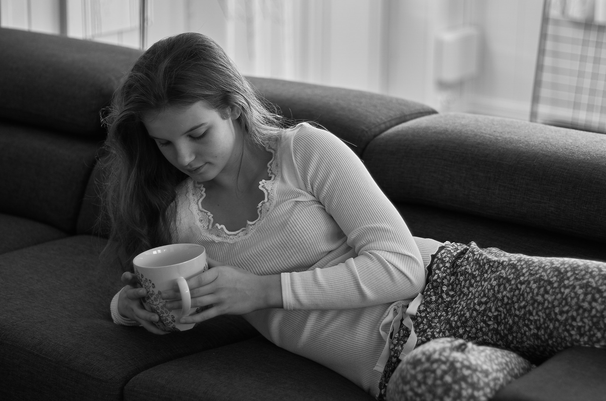 Sony ILCA-77M2 sample photo. Young girl enjoying av cup of tea photography