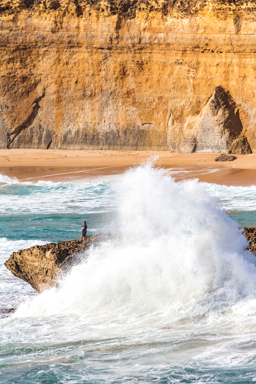 Canon EF 100-400mm F4.5-5.6L IS USM sample photo. Man behind big wave photography