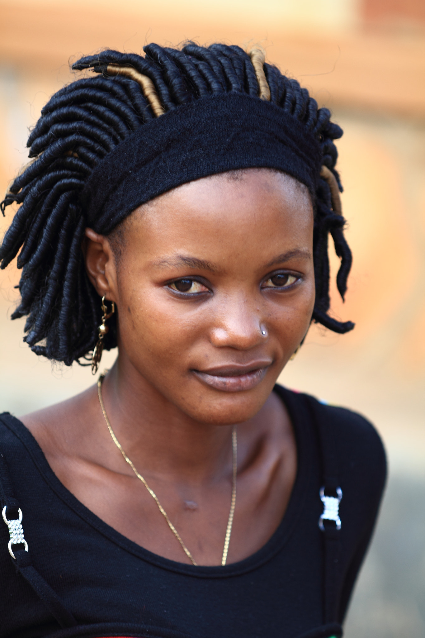 Canon EOS 60D + Canon EF 80-200mm f/2.8L sample photo. Woman of uganda photography