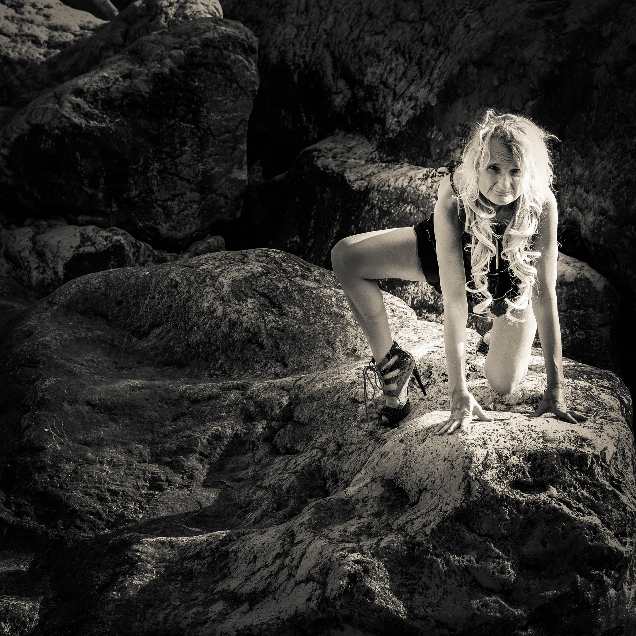 Fujifilm X-Pro1 + Fujifilm XF 60mm F2.4 R Macro sample photo. Woman on rocks 3 photography