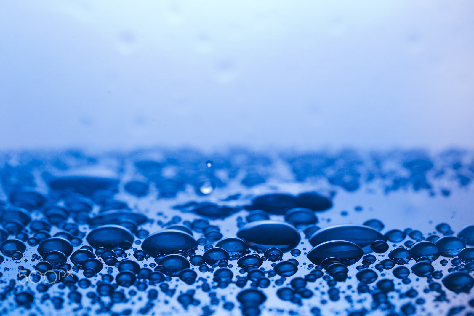 Canon EF 100mm F2.8L Macro IS USM sample photo. Drops, sprays, splashes of water on a colorful background photography