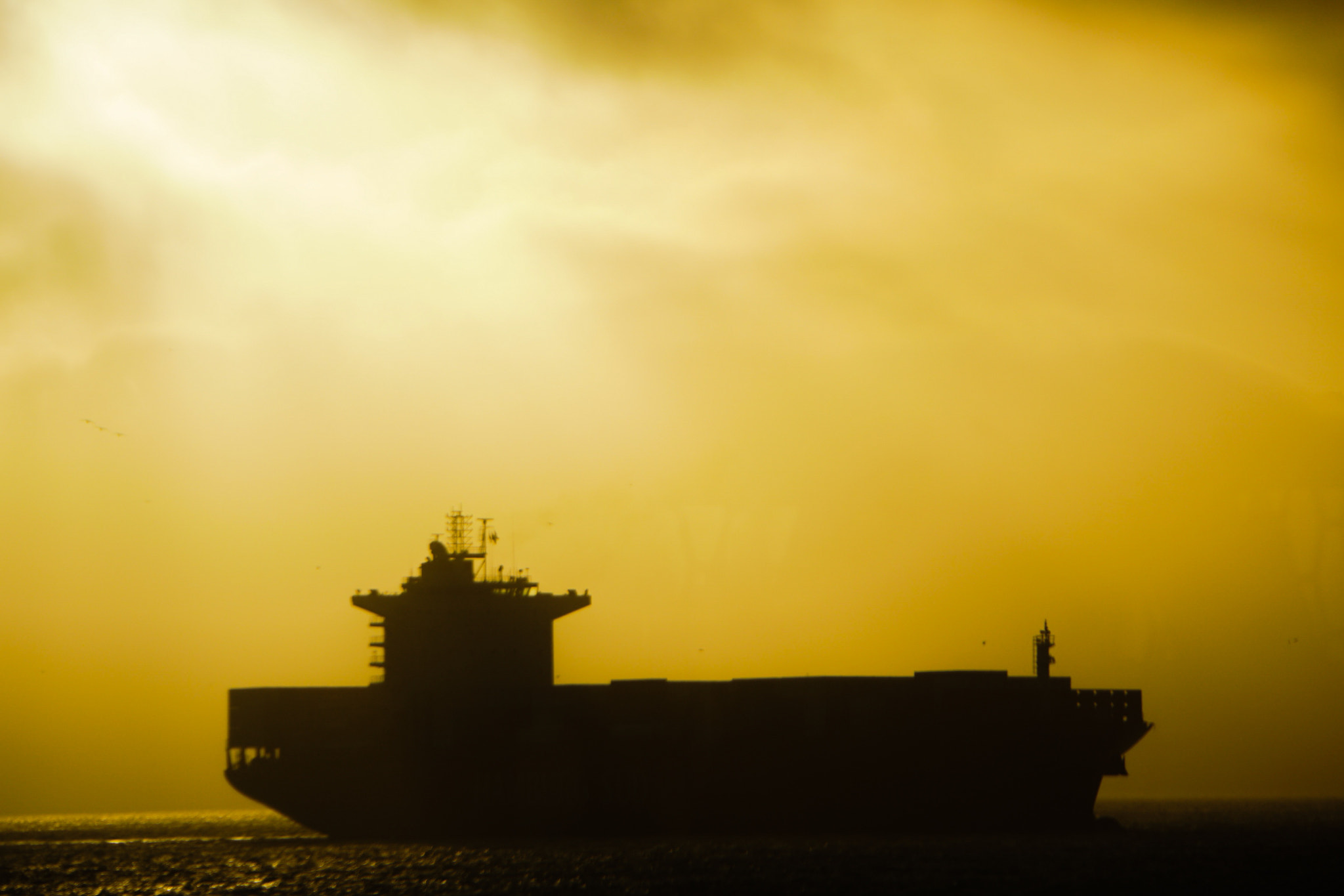 Sony E 18-200mm F3.5-6.3 OSS sample photo. Ship at golden hour photography