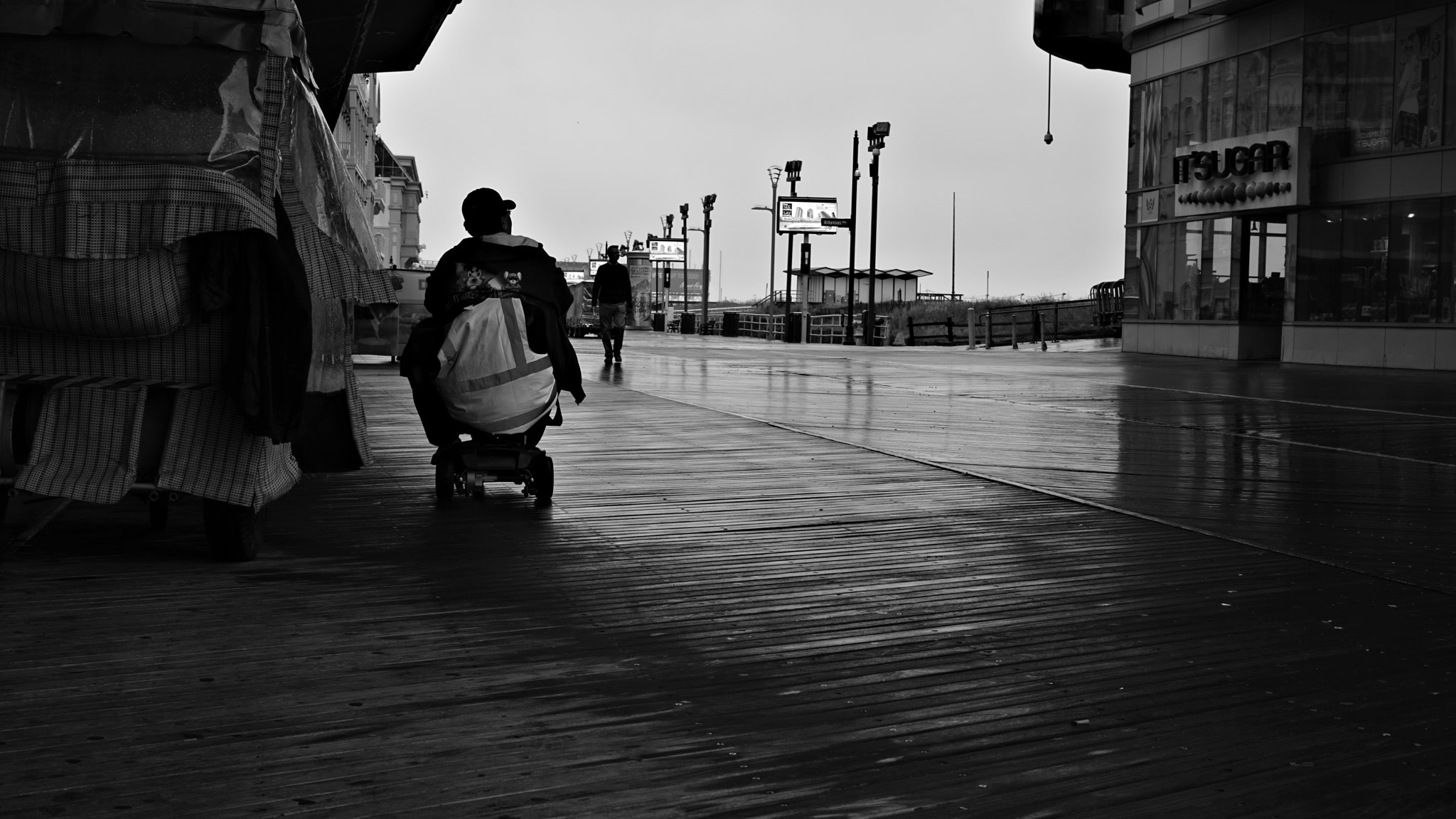 Sony a6000 sample photo. Rolling along the boardwalk no matter what photography