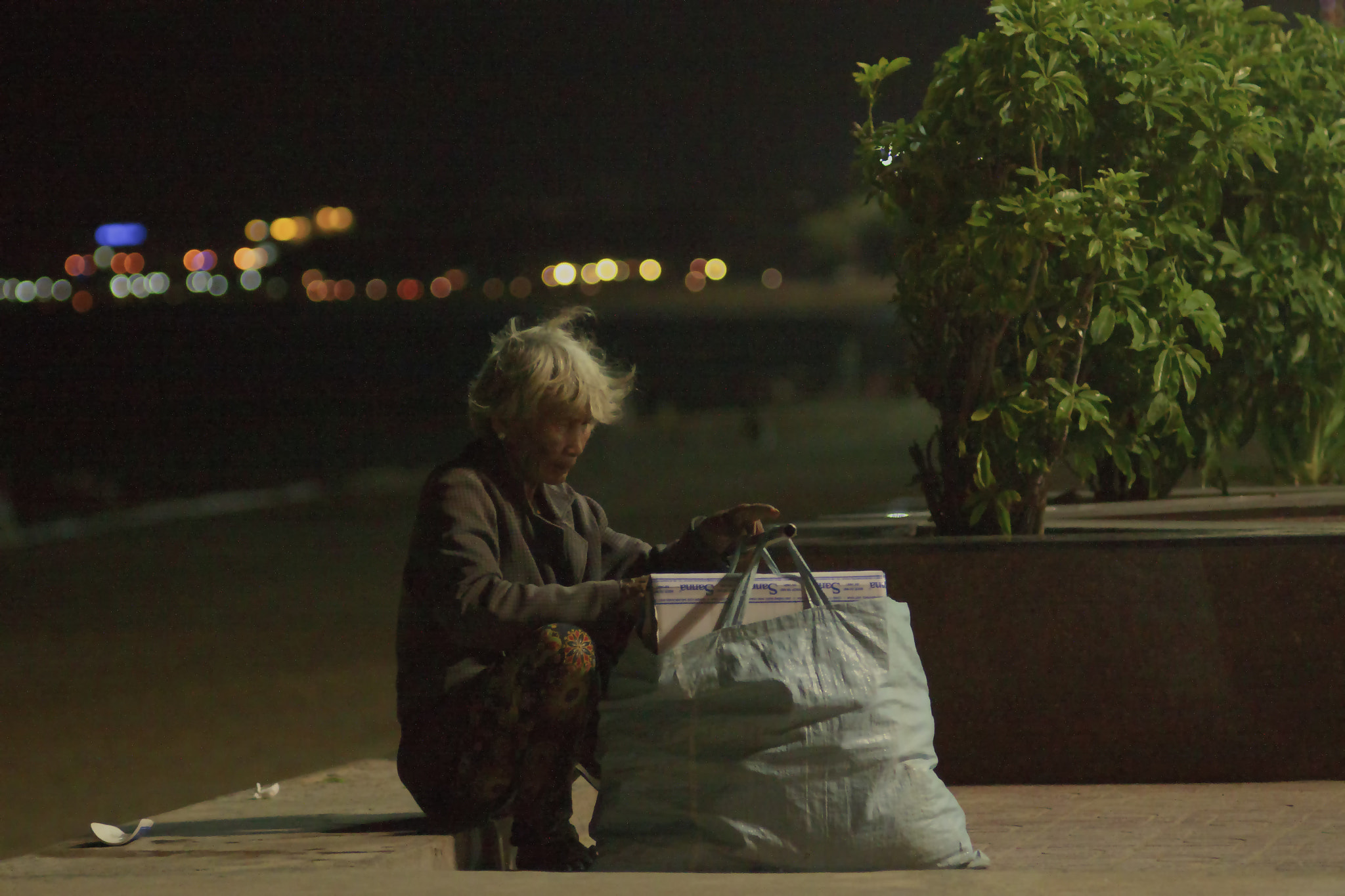 Canon EF 35-80mm f/4-5.6 sample photo. A poor woman photography