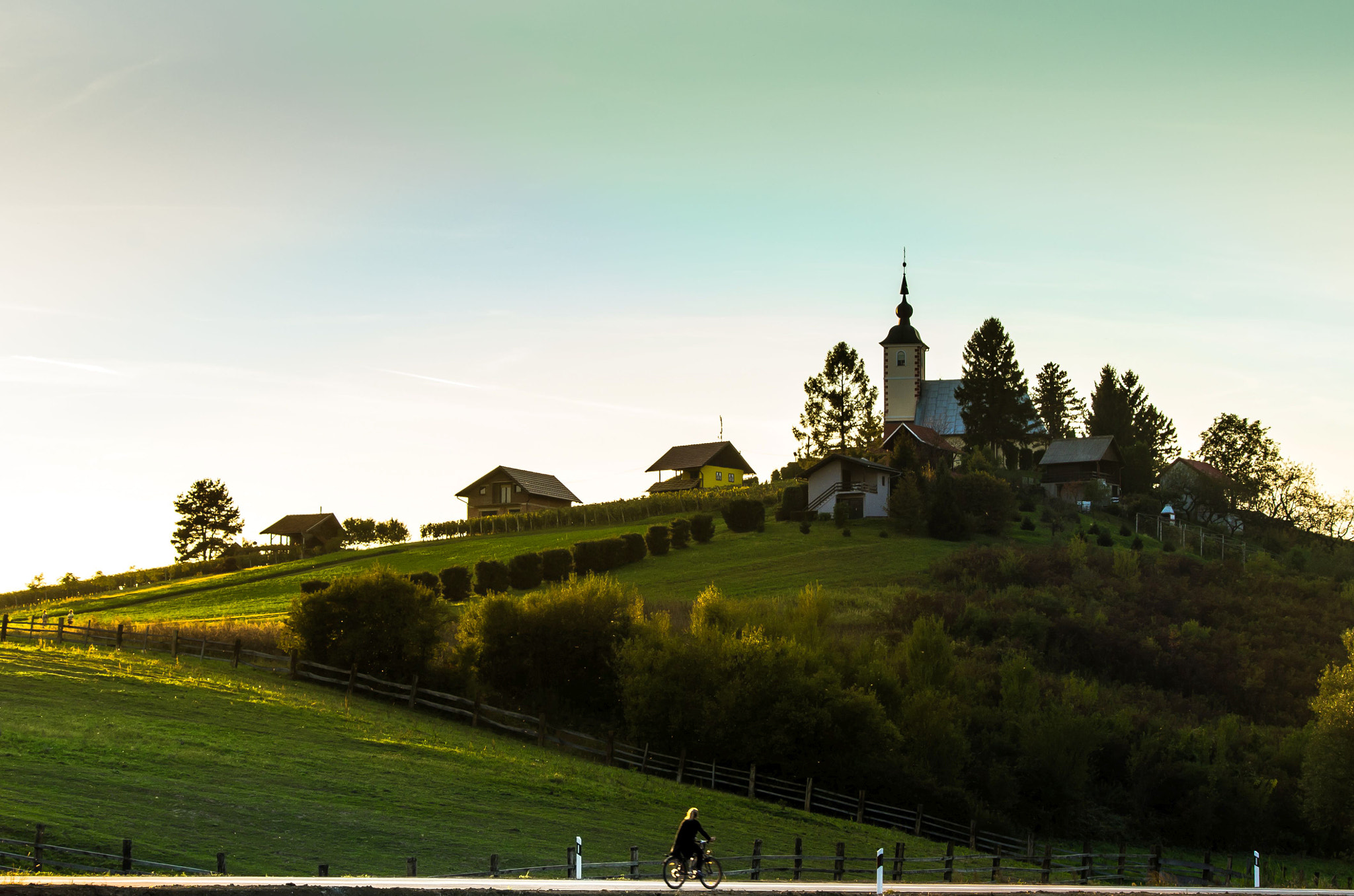 Pentax K-5 II sample photo. Cyclist on road photography