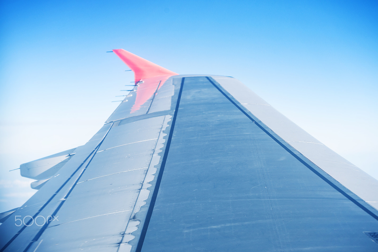 Canon EOS 6D + Canon EF 100mm F2.8L Macro IS USM sample photo. Wing aircraft in blue sky photography