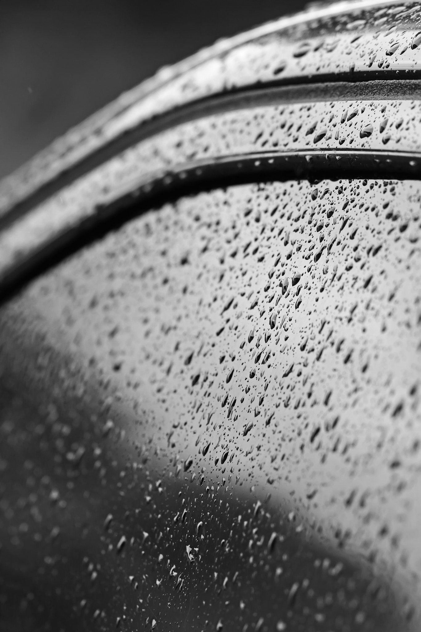 Canon EOS 7D + Canon EF 100mm F2.8L Macro IS USM sample photo. Drops of water on the car after rain photography