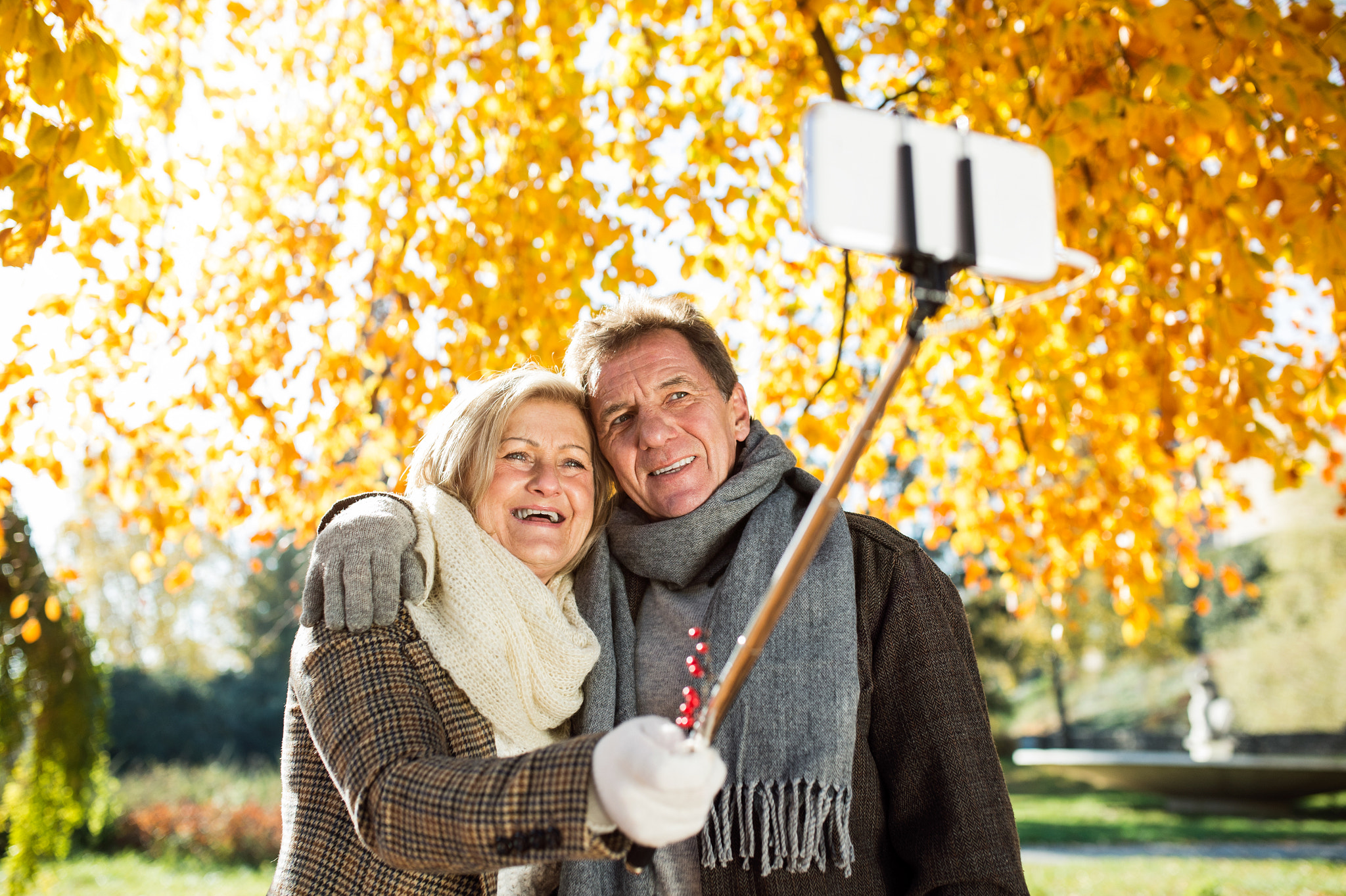 Nikon D4S + Sigma 35mm F1.4 DG HSM Art sample photo. Senior couple taking selfie in park. sunny autumn nature. photography