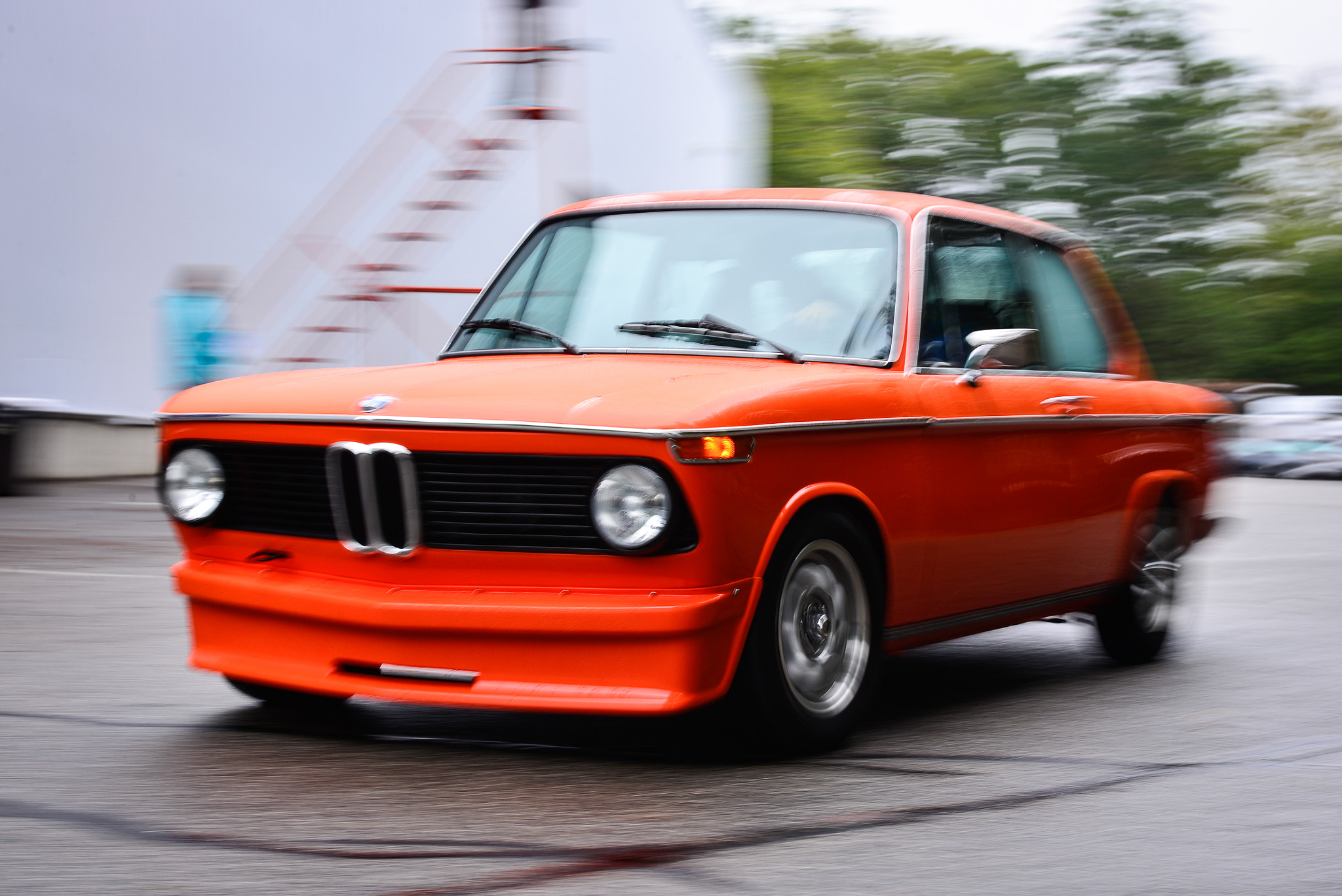 Nikon AF-S Nikkor 28-70mm F2.8 ED-IF sample photo. Orange bmw 2002 rolling photography