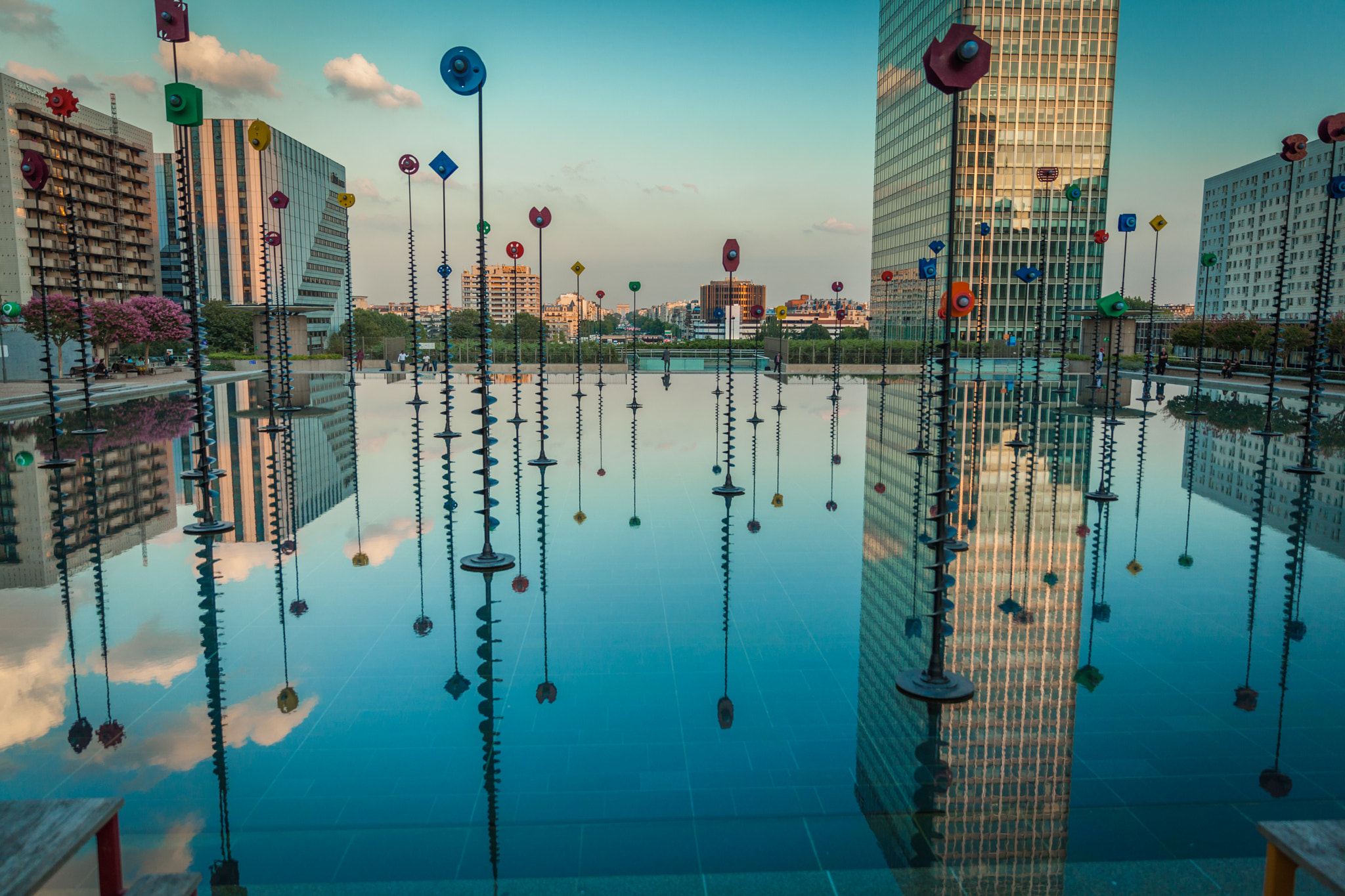 Modern art is reflected in the fountain in Paris