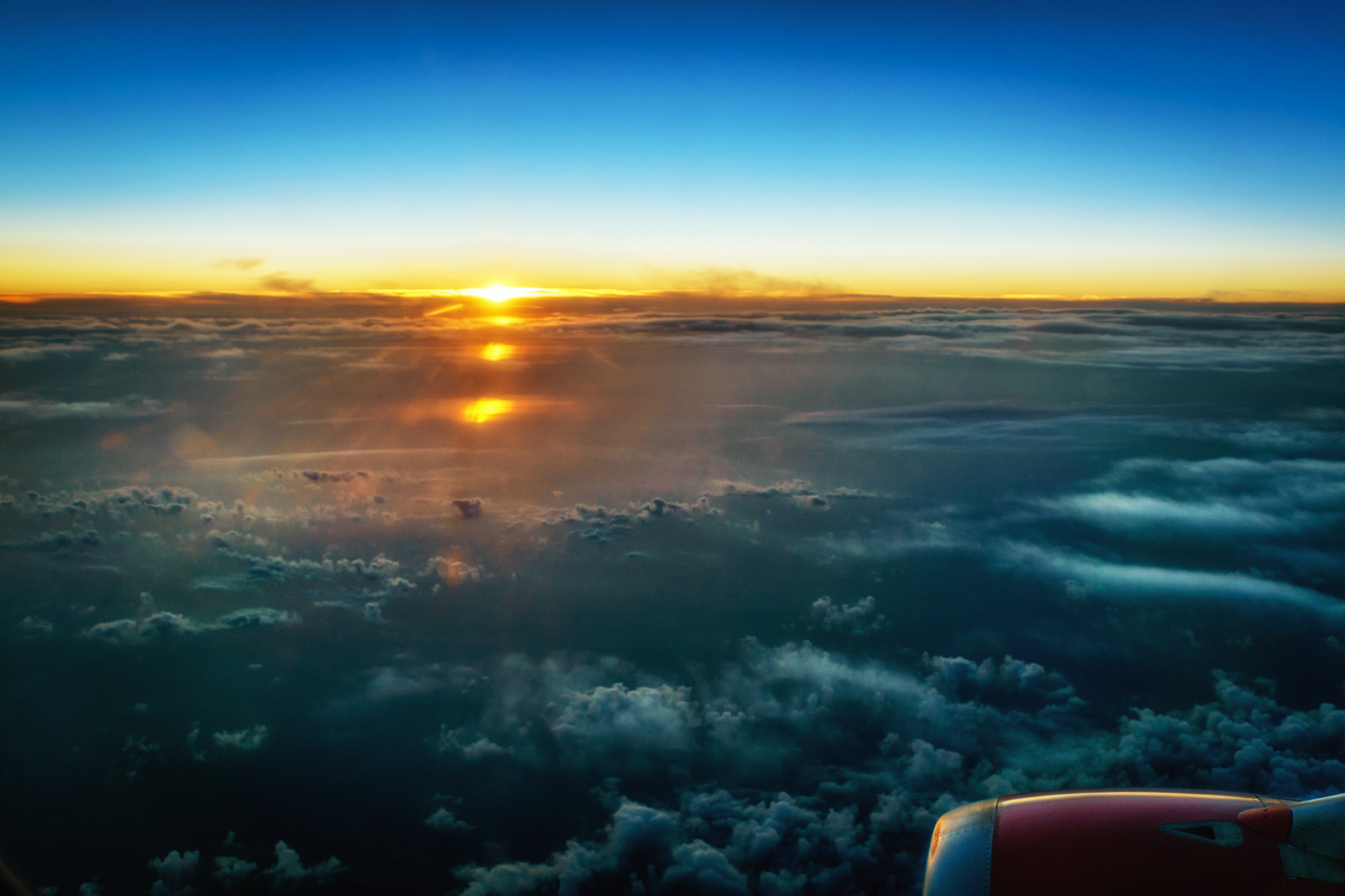 Sony E 18-200mm F3.5-6.3 OSS sample photo. Sunset above the clouds photography