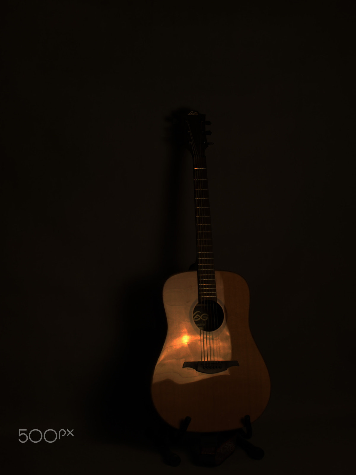 Olympus Zuiko Digital ED 40-150mm F4.0-5.6 sample photo. Guitar photography