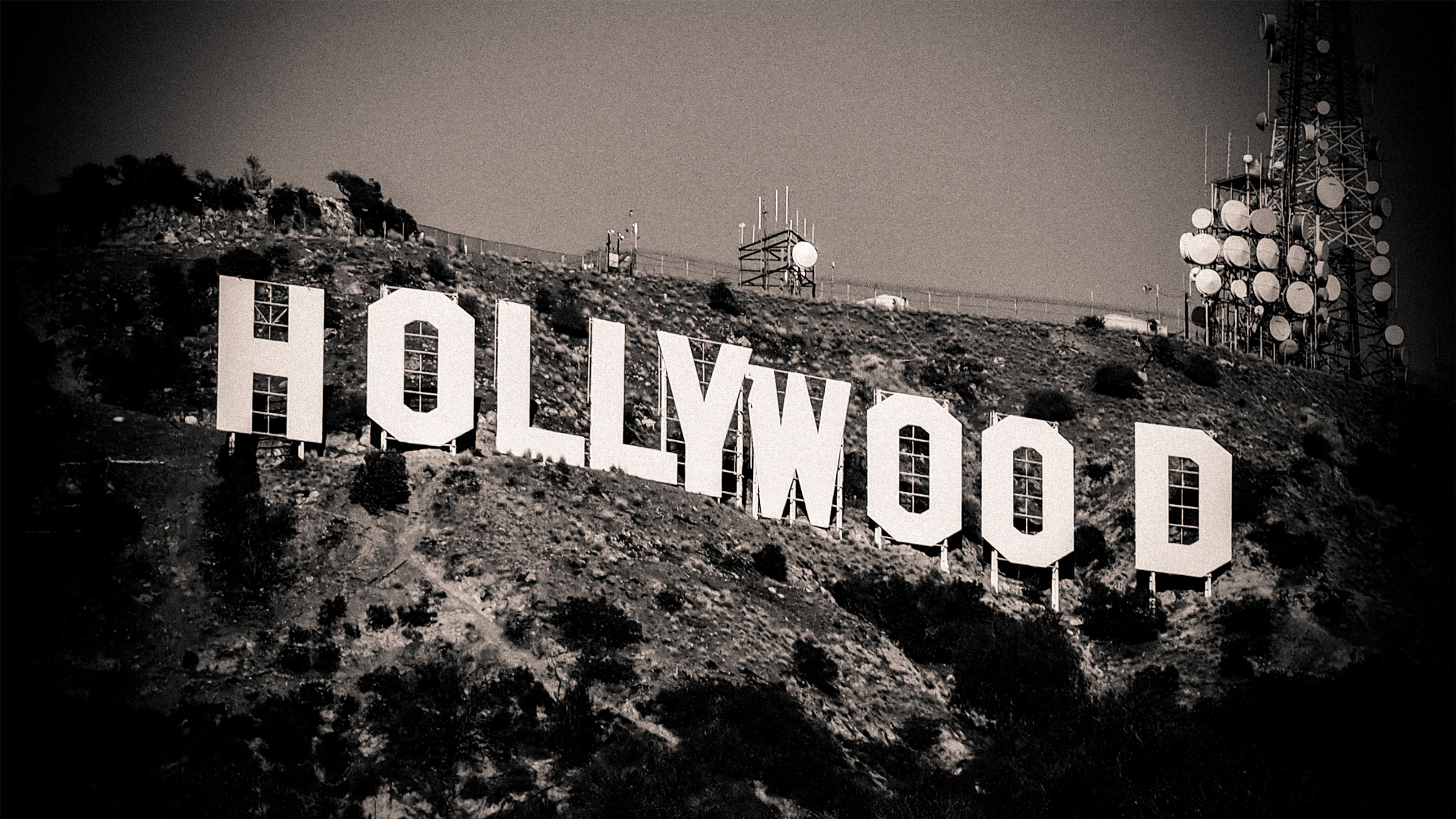 OLYMPUS M.14-150mm F4.0-5.6 II sample photo. Hollywood sign (sepia vignette) photography