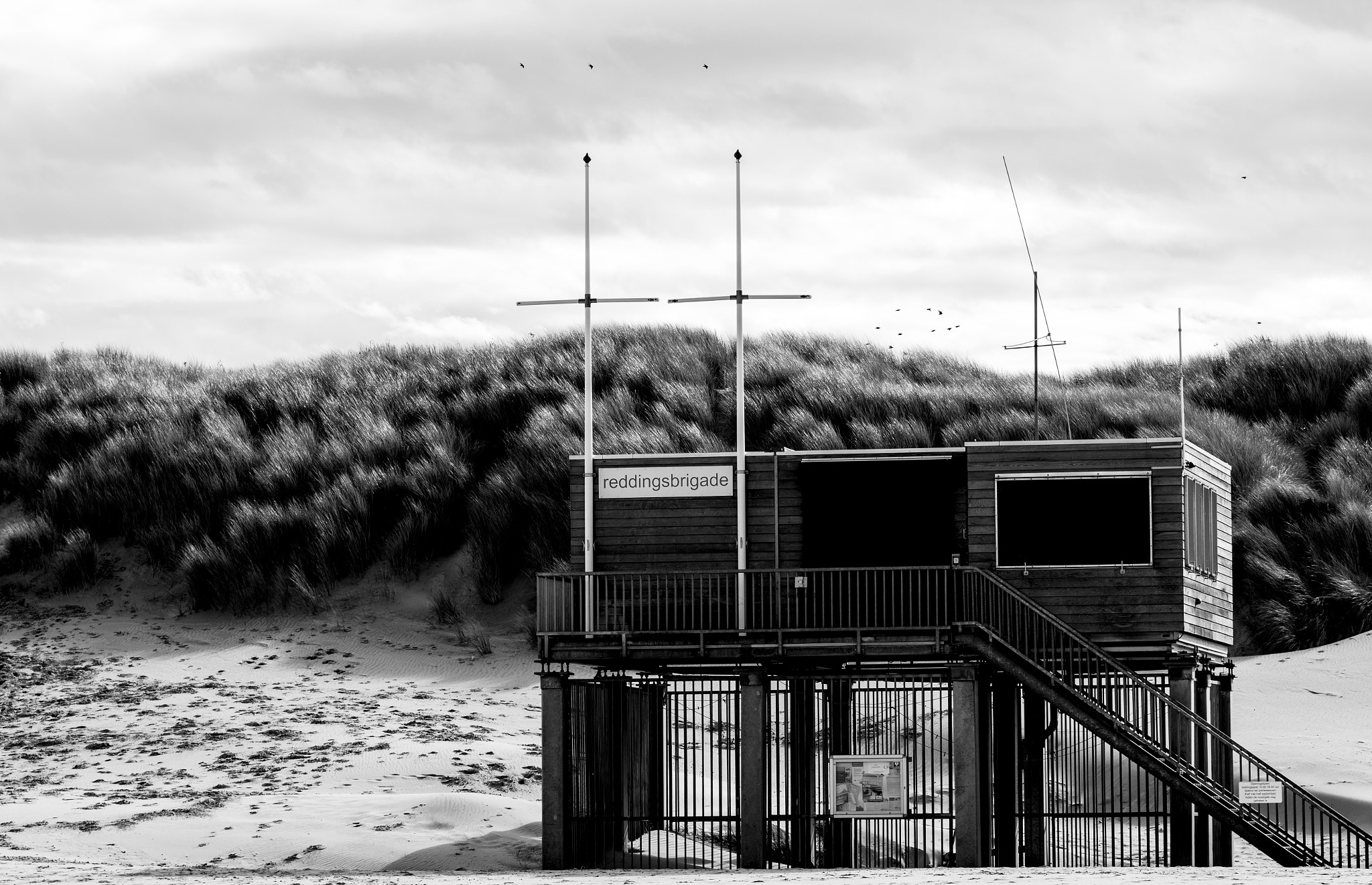 Sigma 105mm F2.8 EX DG OS HSM sample photo. Safety house on beach photography
