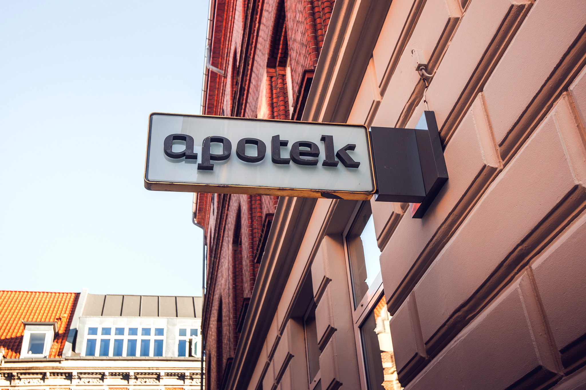 Sony Alpha DSLR-A900 sample photo. Apotheke and pharmacy sign on a building photography