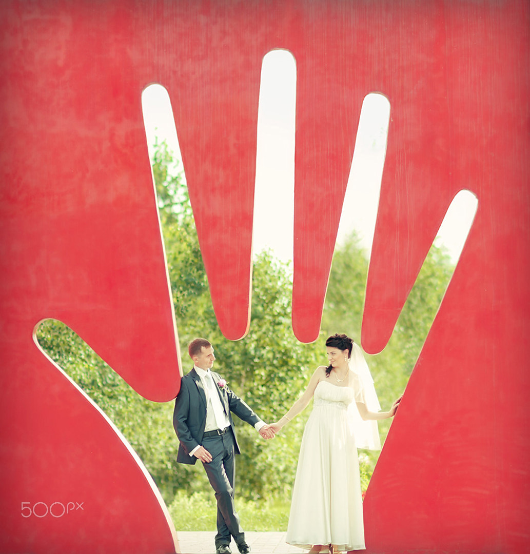 AF DC-Nikkor 135mm f/2D sample photo. Hands photography
